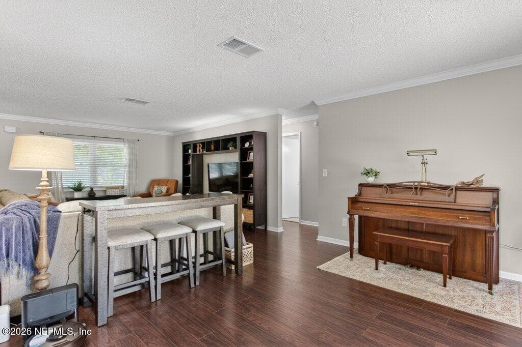 An airy, multi-functional floor plan showing the intuitive connection between the main living hubs and private hallways. — 956 ESPINADO Avenue, St. Augustine, FL 32086