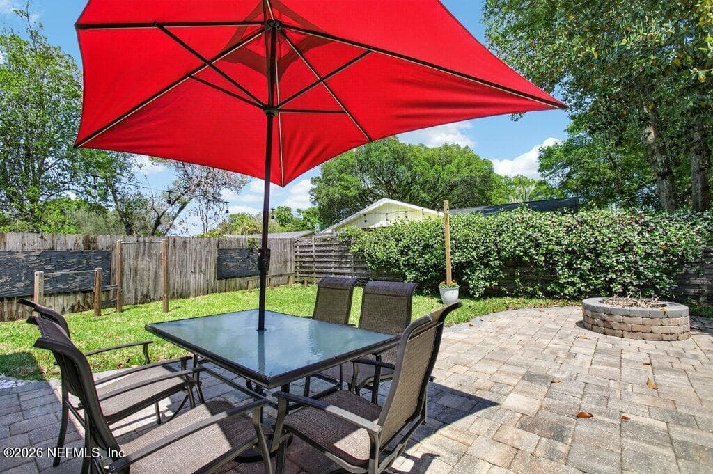 Spacious outdoor entertaining area with a stone paver patio, perfect for grilling and enjoying the Florida sunshine. — 956 ESPINADO Avenue, St. Augustine, FL 32086