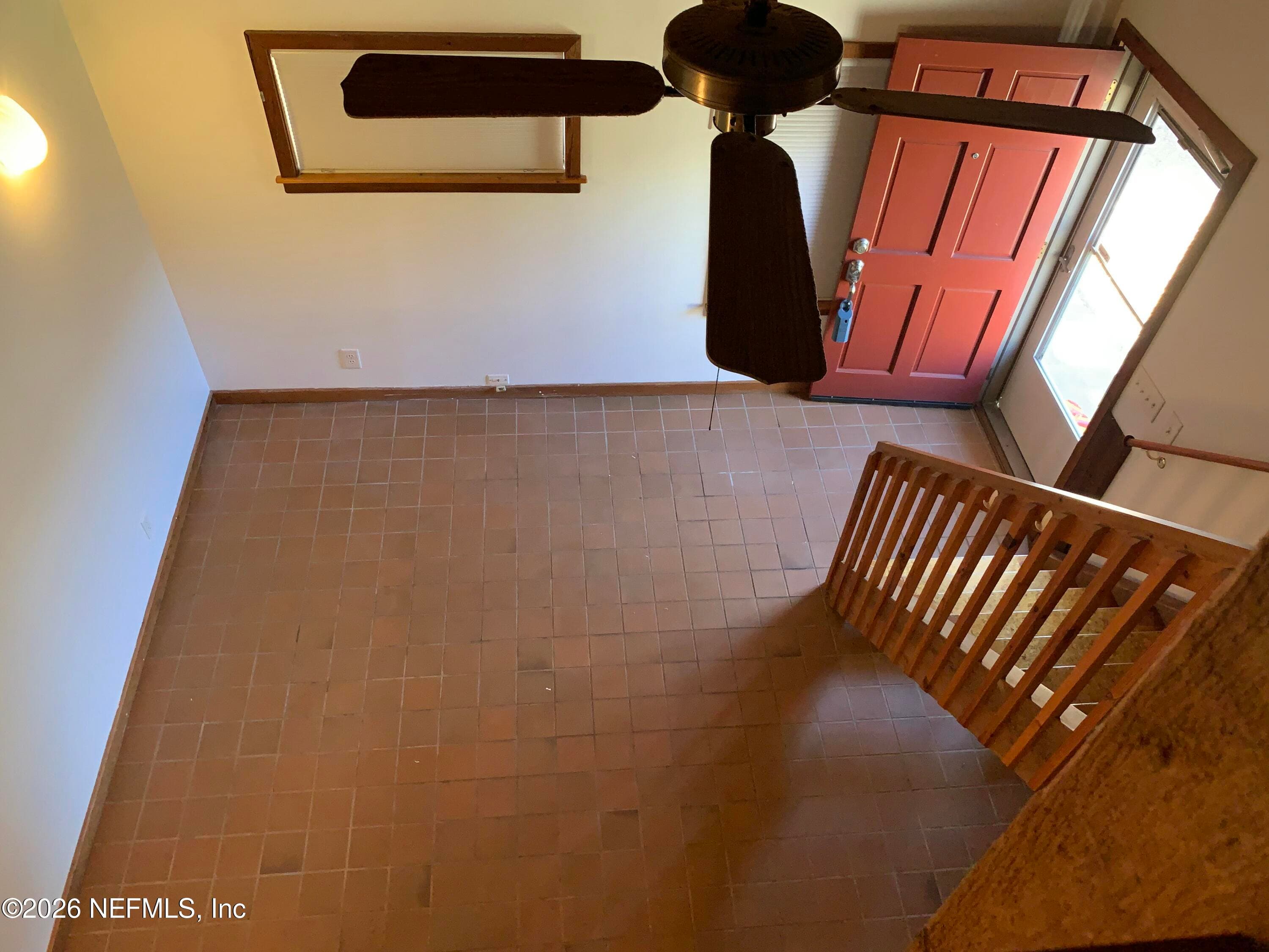 Entry into living area. Level 1 living area, kitchen, bathroom tub with shower. — 120 BEACH Avenue, Atlantic Beach, FL 32233