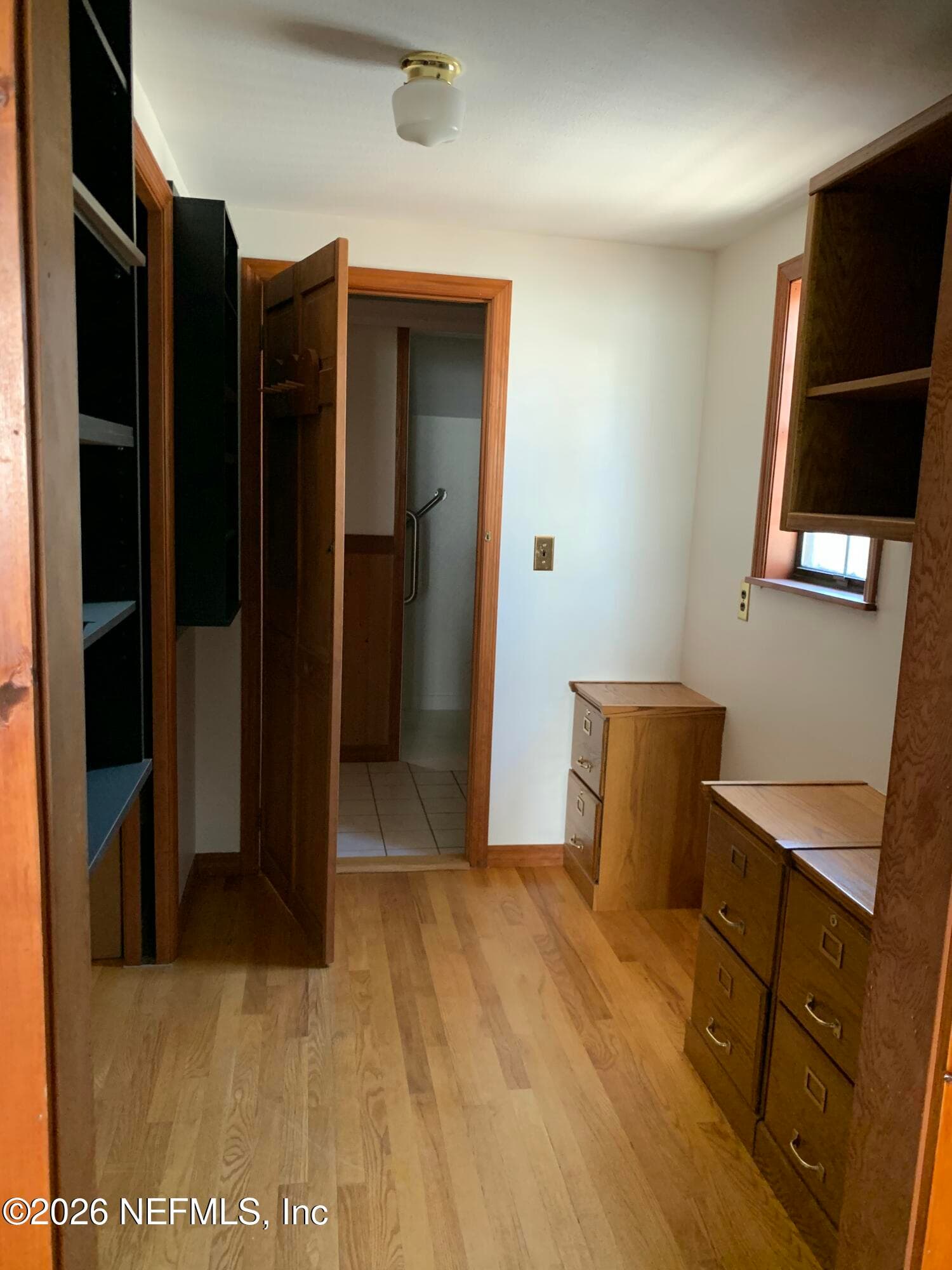 Cabinetry & closets with entry into bathroom with walk in shower. — 120 BEACH Avenue, Atlantic Beach, FL 32233