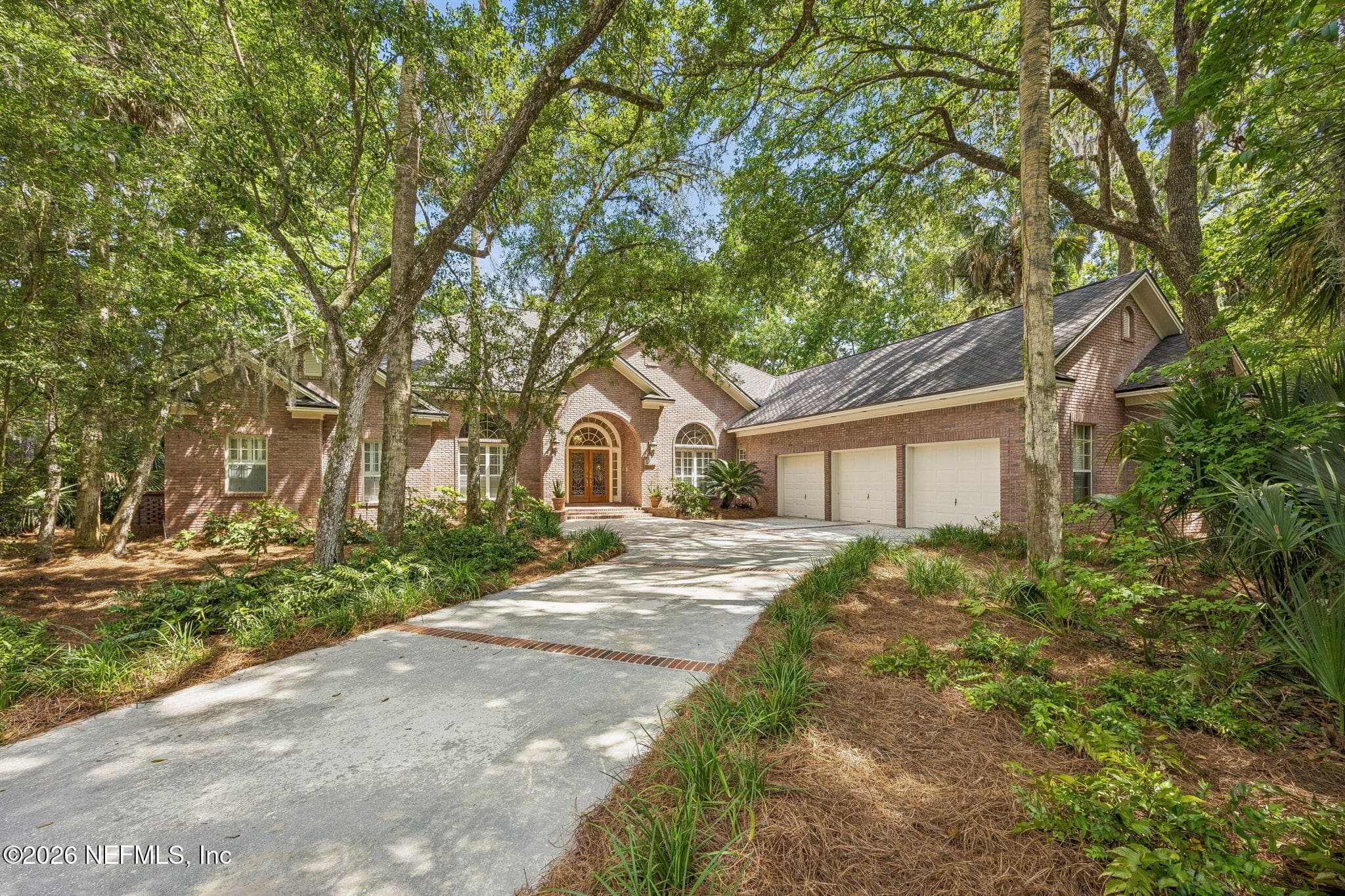 Front of house showing 3 car garage — 6030 OAKBROOK Court, Ponte Vedra Beach, FL 32082