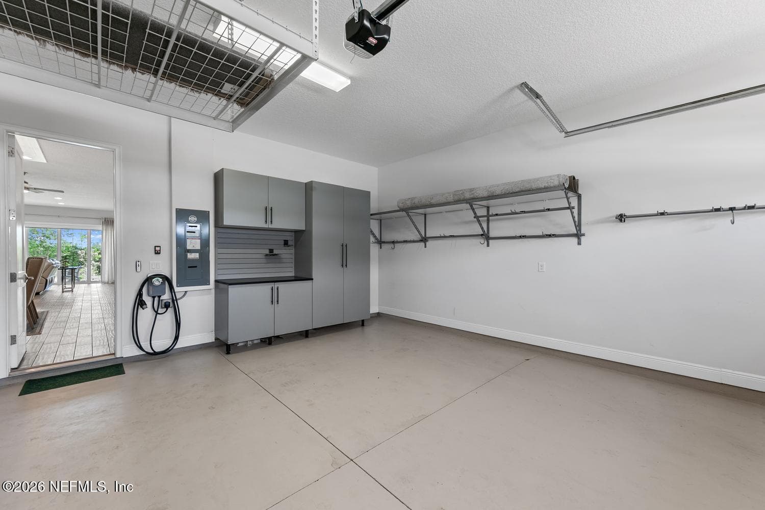 Custom storage lift and carpenter / tool counter — 69 RUM RUNNER Way, St. Johns, FL 32259