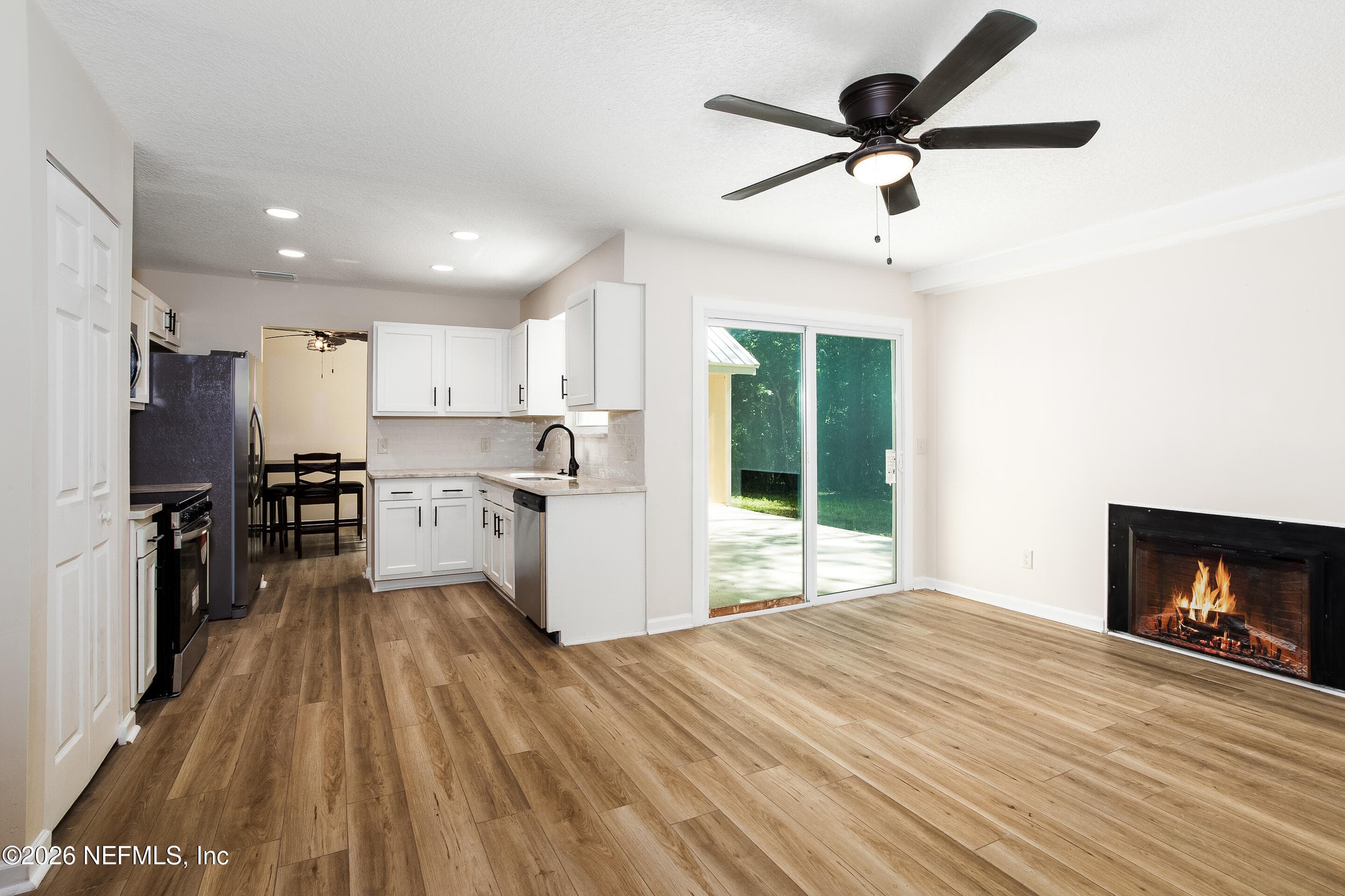 Sliding glass doors to patio — 1225 BEE Street N, Orange Park, FL 32065