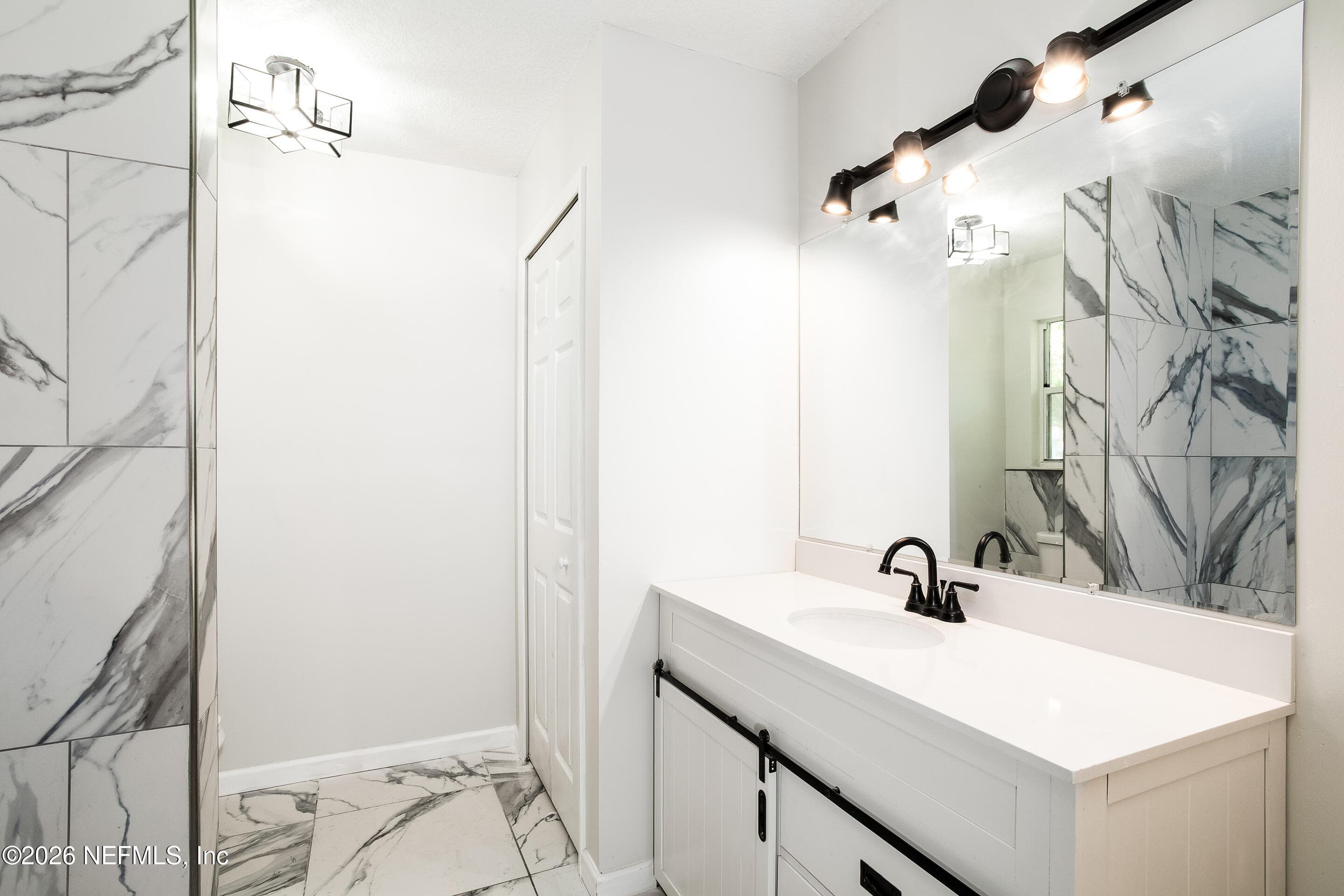 Full size linen closet spa tile thruout — 1225 BEE Street N, Orange Park, FL 32065