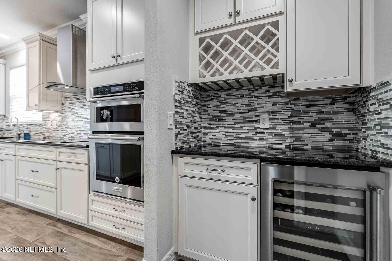 Butler's pantry with wine rack and wine cooler — 129 SWEET PINE Trail, Ponte Vedra, FL 32081