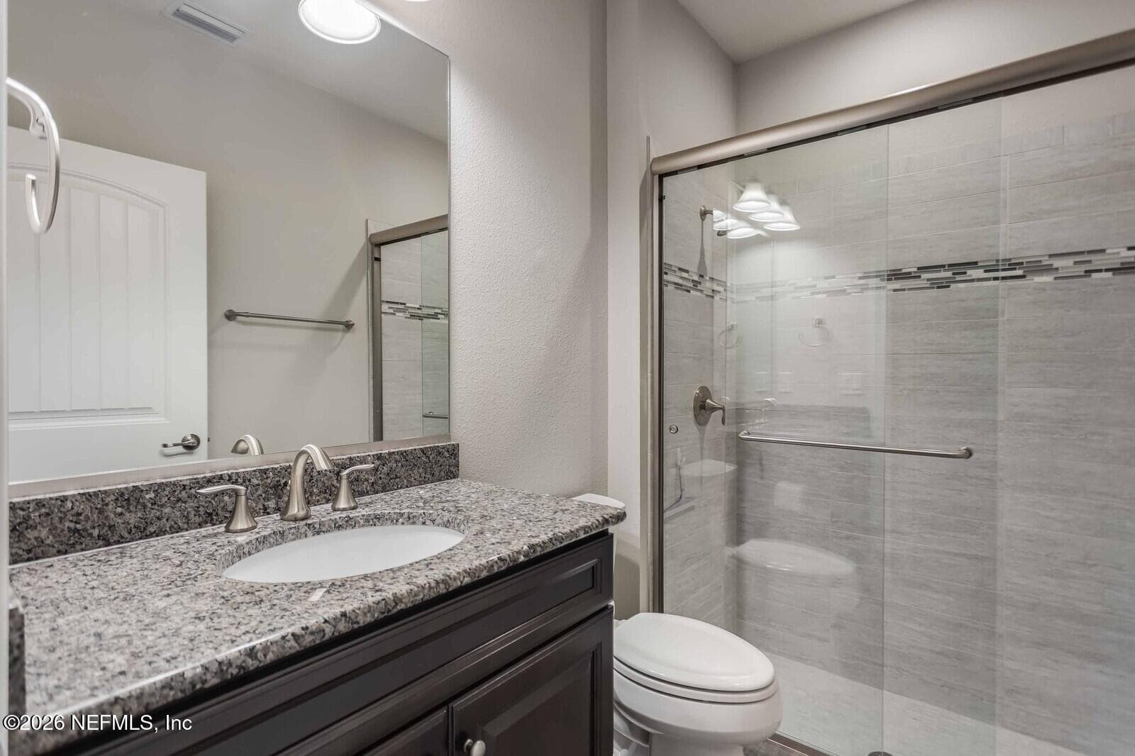 Second bath downstairs with walk in tile shower — 129 SWEET PINE Trail, Ponte Vedra, FL 32081