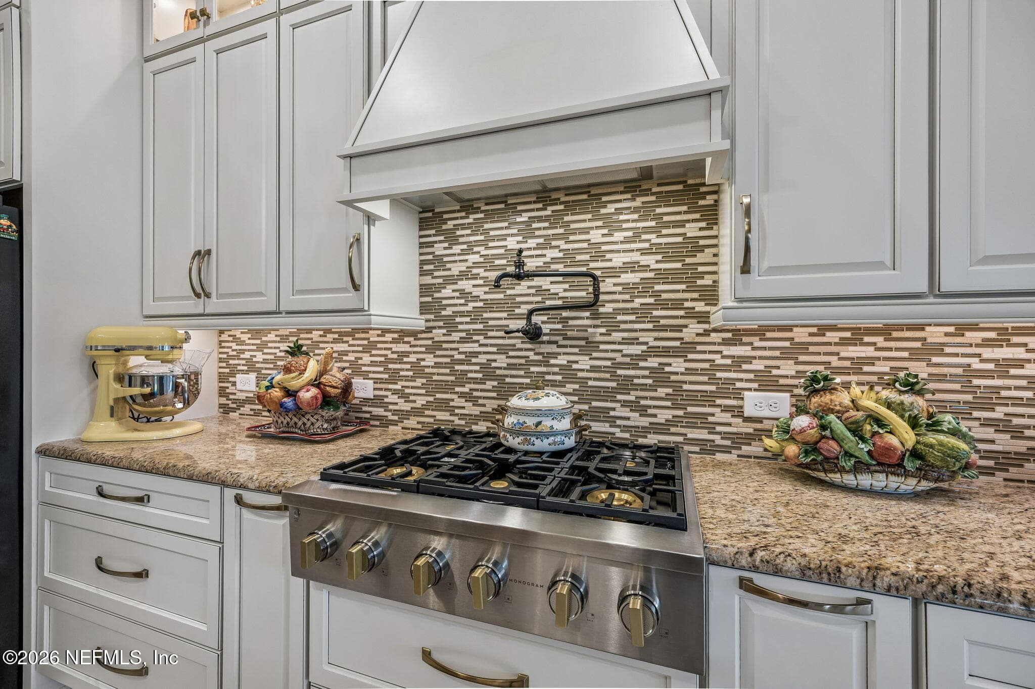Custom Vent Hood and pot filler over high end six burner gas cooktop — 2852 CASSIA Lane, Jacksonville, FL 32246