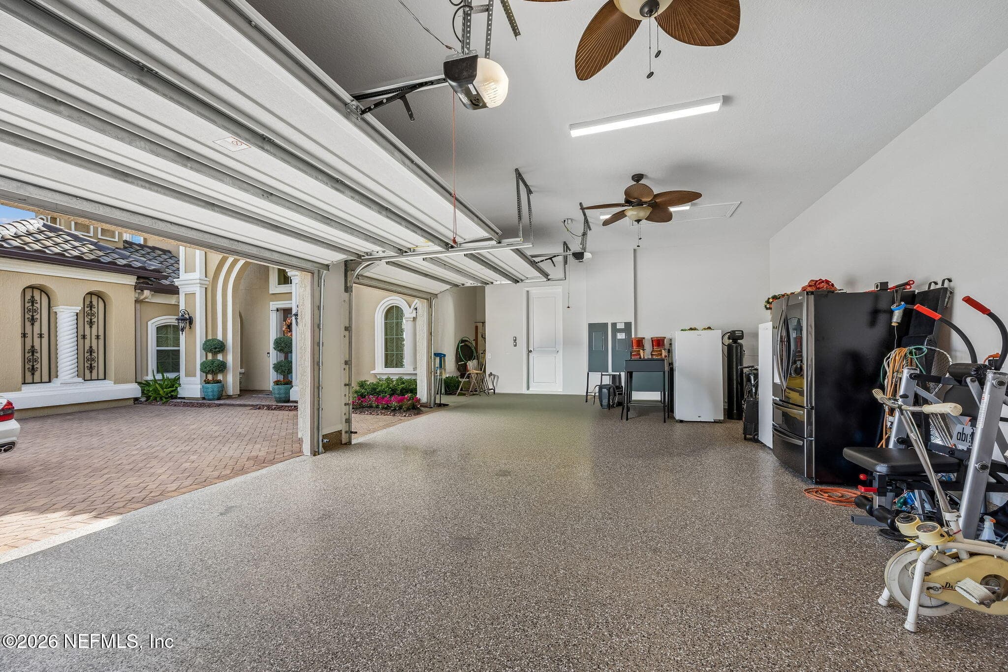 Epoxy floors, ceiling fans, EV circuit, added electrical circuits — 2852 CASSIA Lane, Jacksonville, FL 32246
