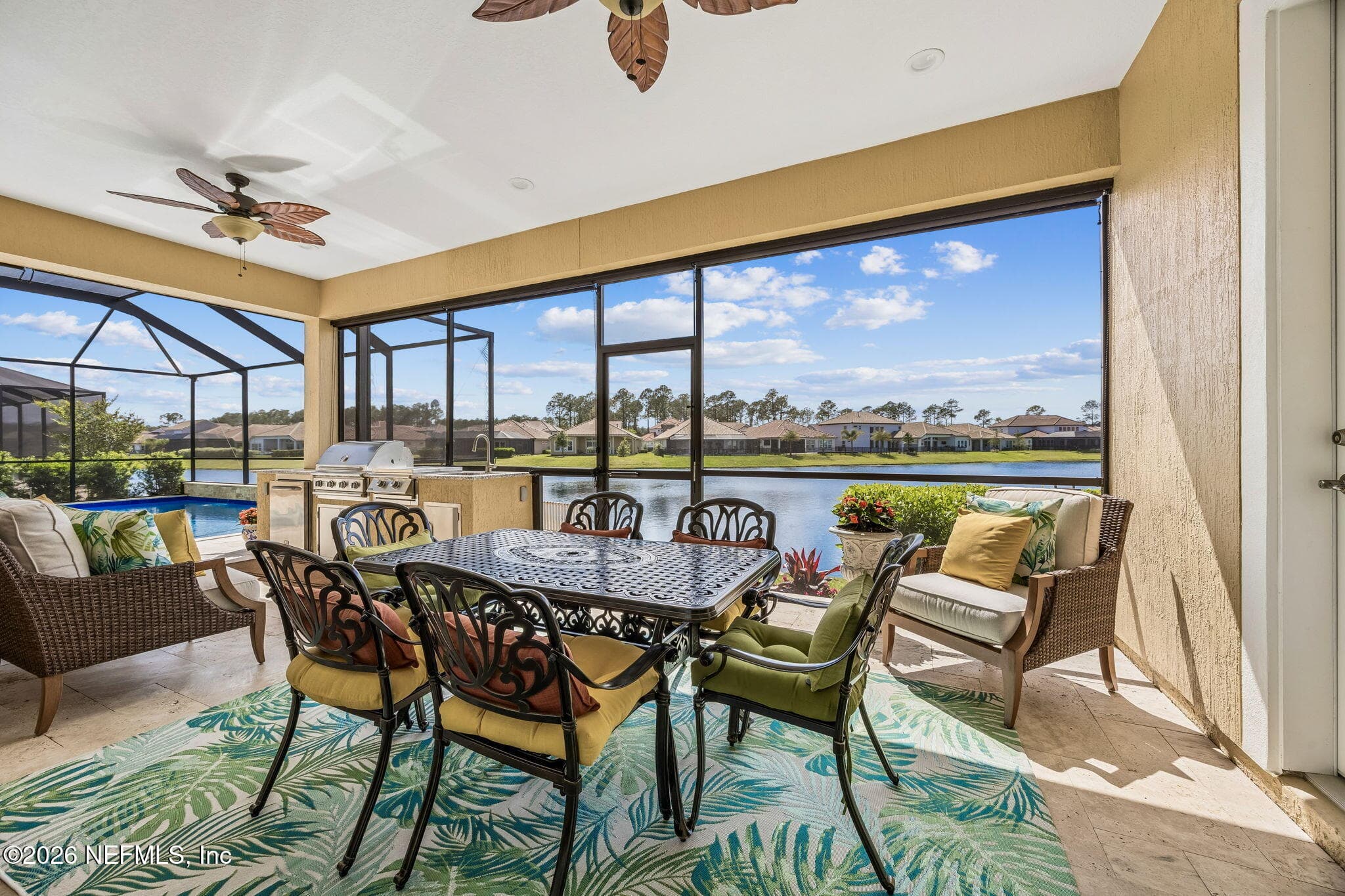 Coolaroo outdoor roller shade for privacy installed all around the patio area. with full bath — 2852 CASSIA Lane, Jacksonville, FL 32246