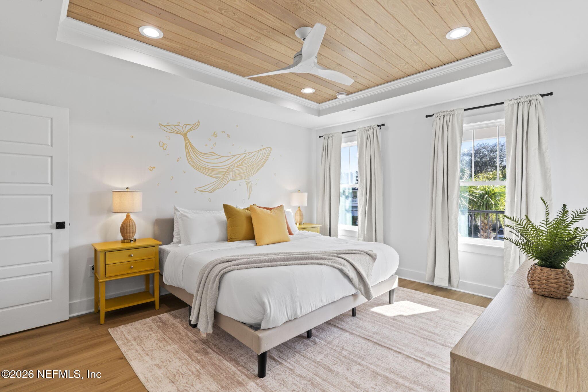 Primary bedroom with tongue and groove ceiling and ventilated wood shelving systems in ALL closets — 925 2ND Avenue S, Jacksonville Beach, FL 32250