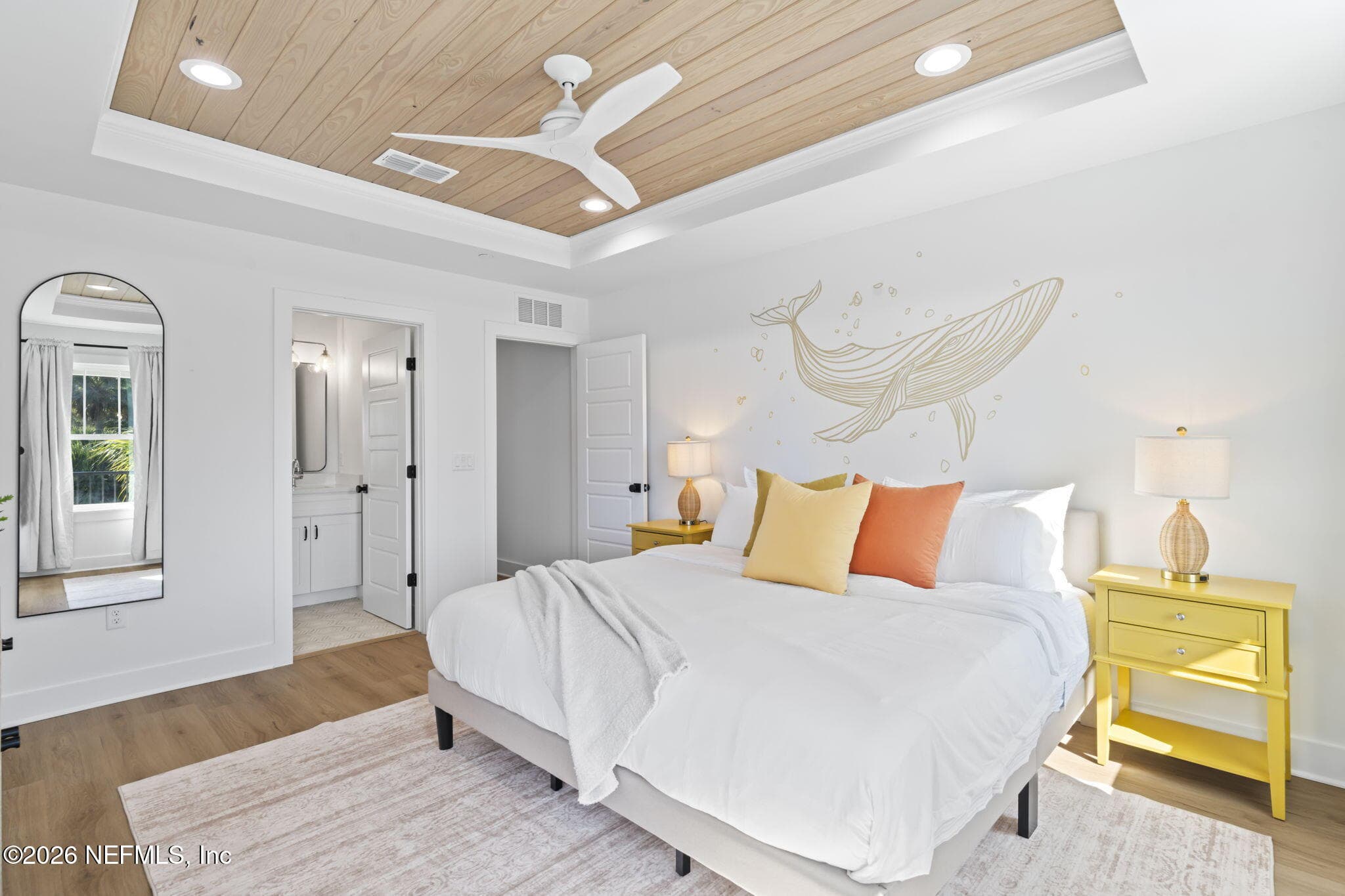 Primary bedroom with tongue and groove ceiling and ventilated wood shelving systems in ALL closets — 925 2ND Avenue S, Jacksonville Beach, FL 32250