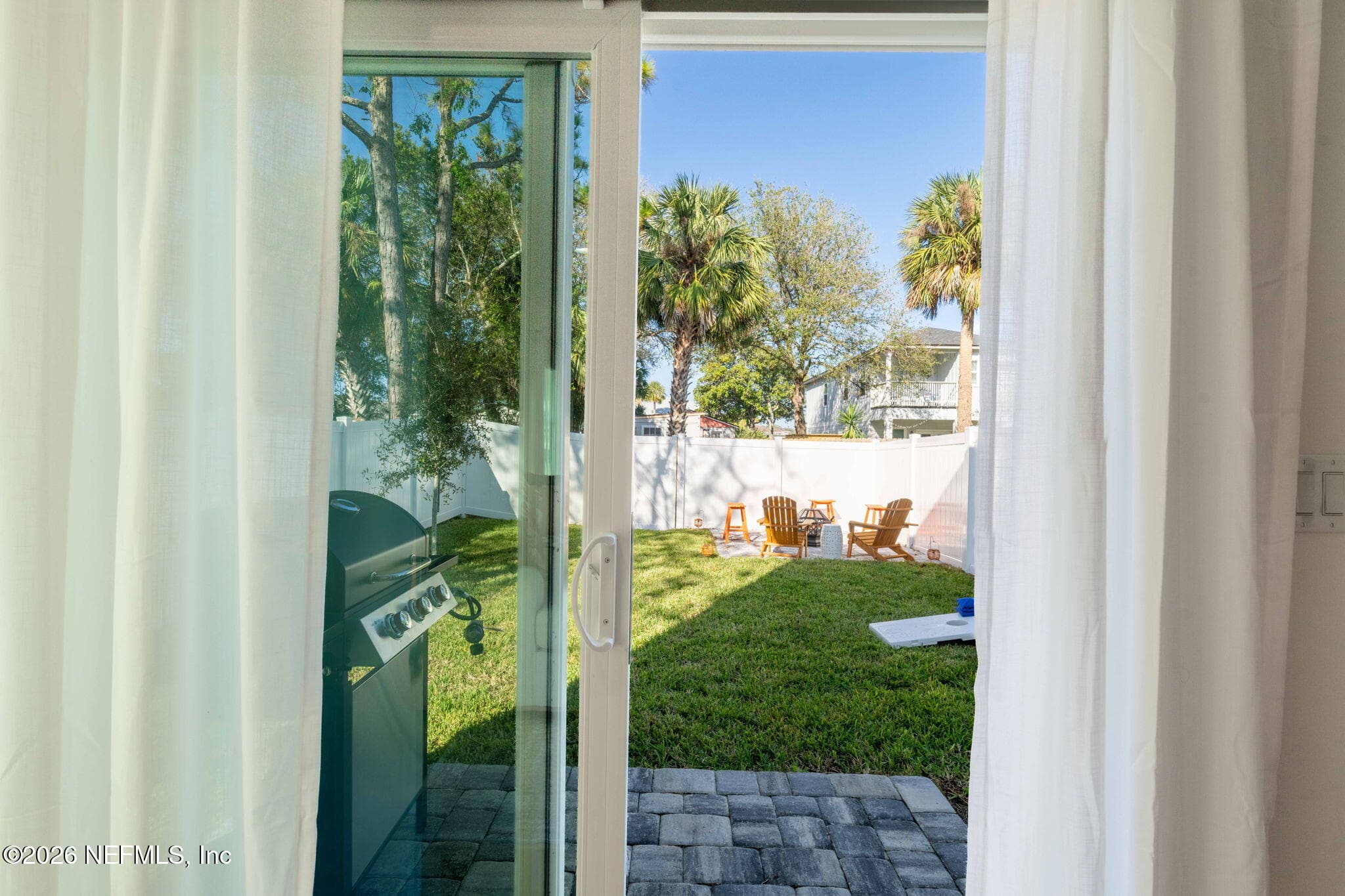 Fully fenced yard with paver area — 925 2ND Avenue S, Jacksonville Beach, FL 32250