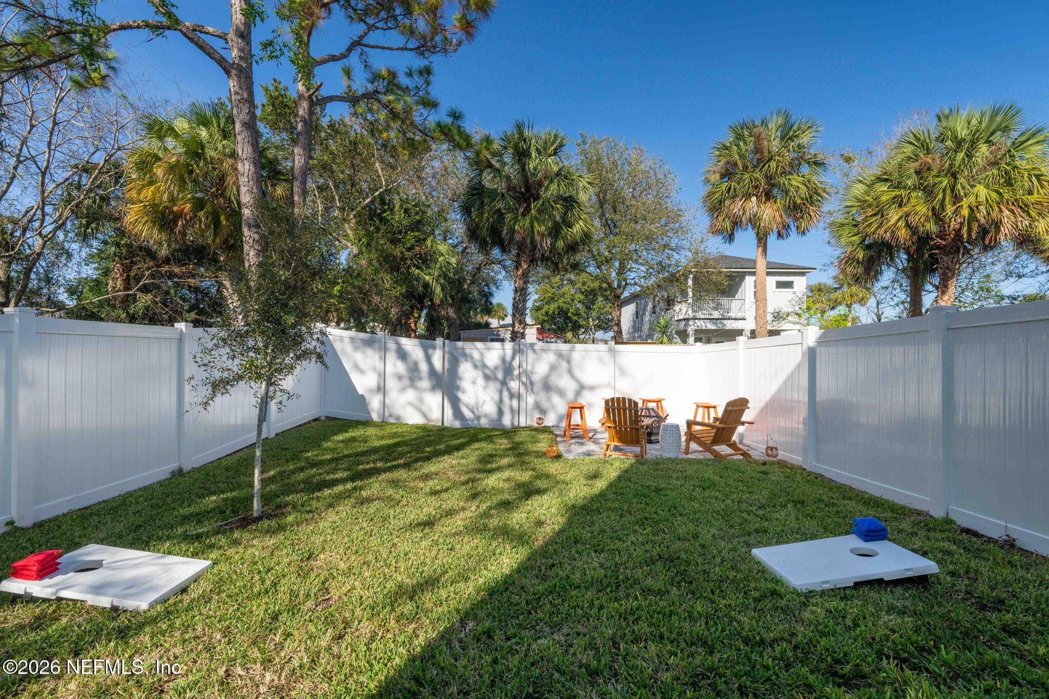 Fenced backyard and fire pit area — 925 2ND Avenue S, Jacksonville Beach, FL 32250