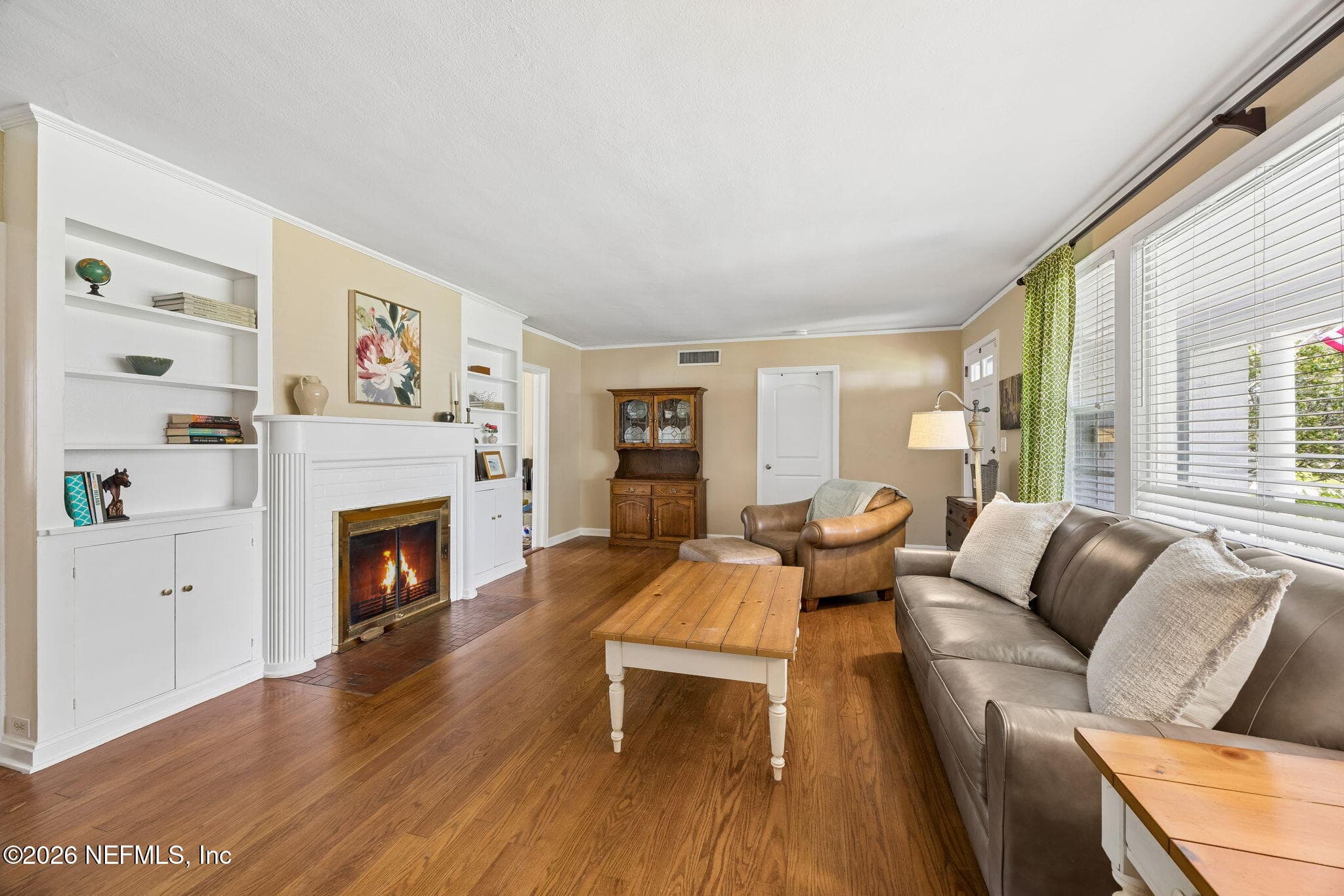 Brick Fireplace with Built in Shelving and Cabinets — 4338 GARIBALDI Avenue, Jacksonville, FL 32210