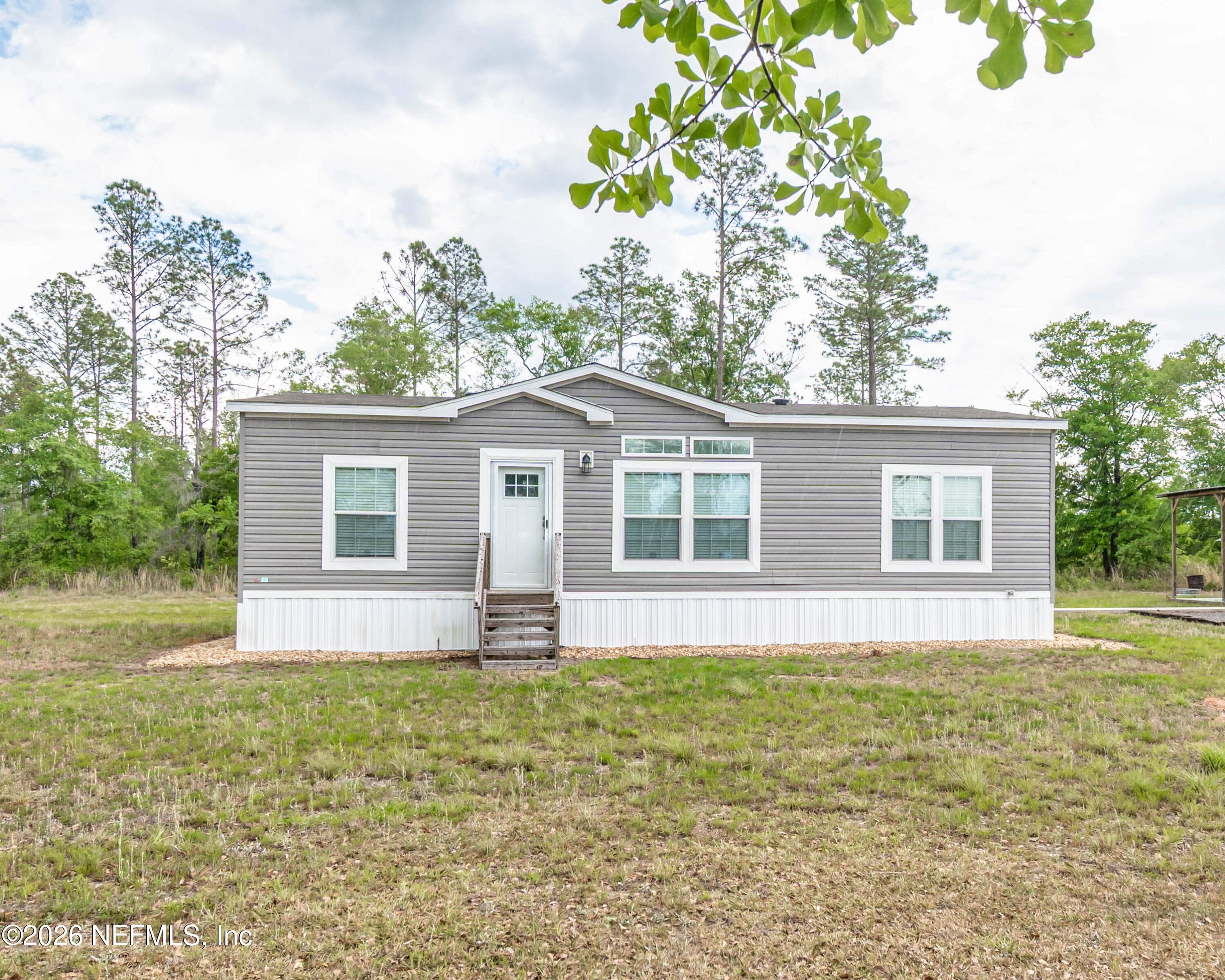 Photo 2 of 7697 BILL DAVIS Road, Glen St. Mary, FL 32040