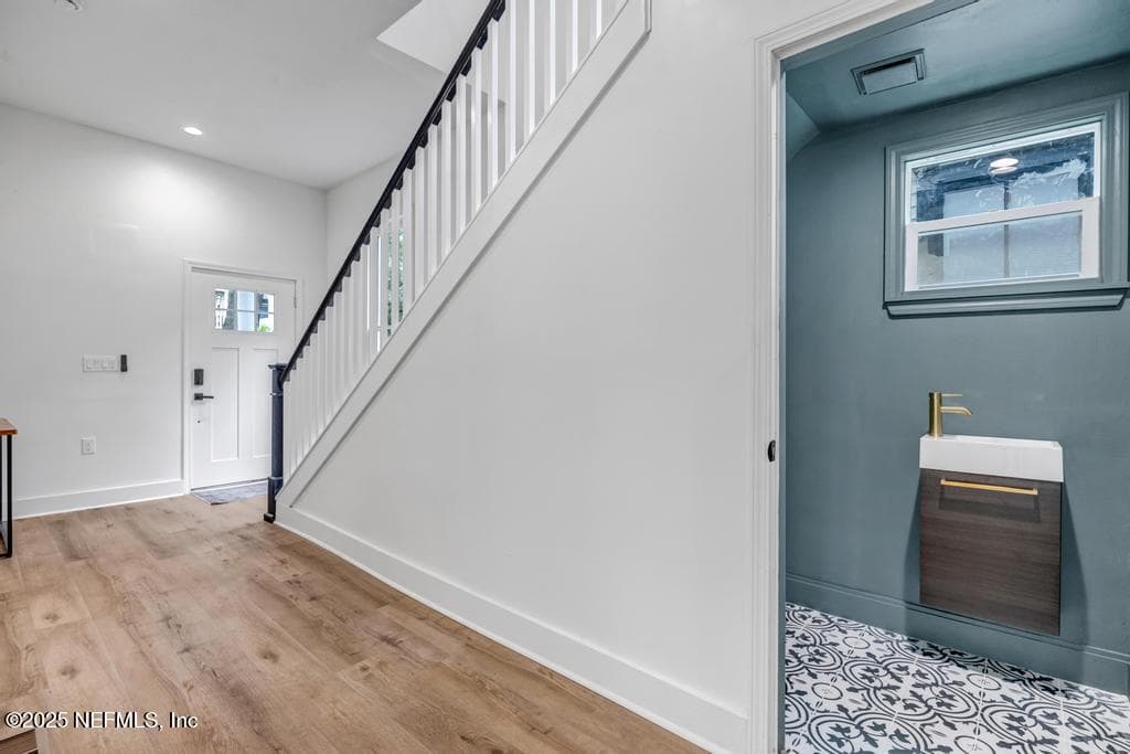 Powder room bath under stairs — 1827 N MARKET Street, Jacksonville, FL 32206