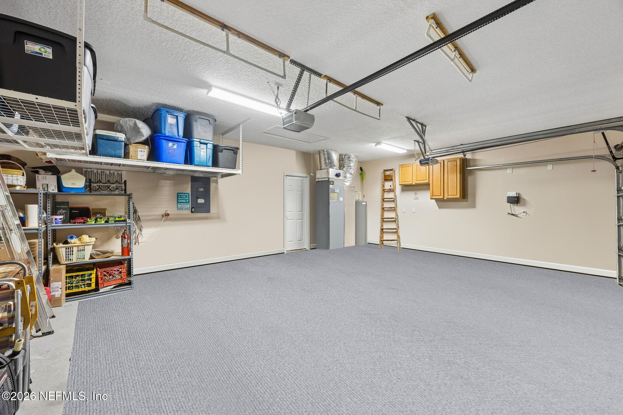 A three car garge for cars, golf cart and ample storage. — 85225 AMAGANSETT Drive, Fernandina Beach, FL 32034