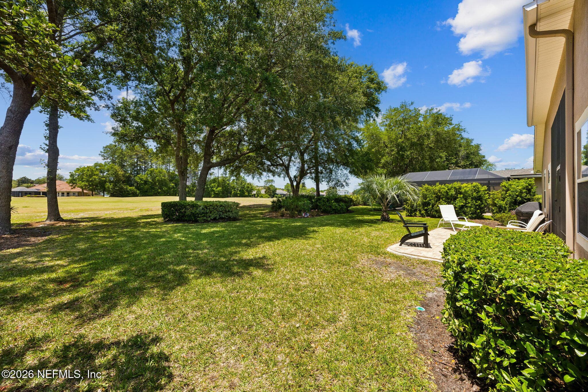Peaceful golf course views can be enjoyed from the lanai or extended patio. — 85225 AMAGANSETT Drive, Fernandina Beach, FL 32034