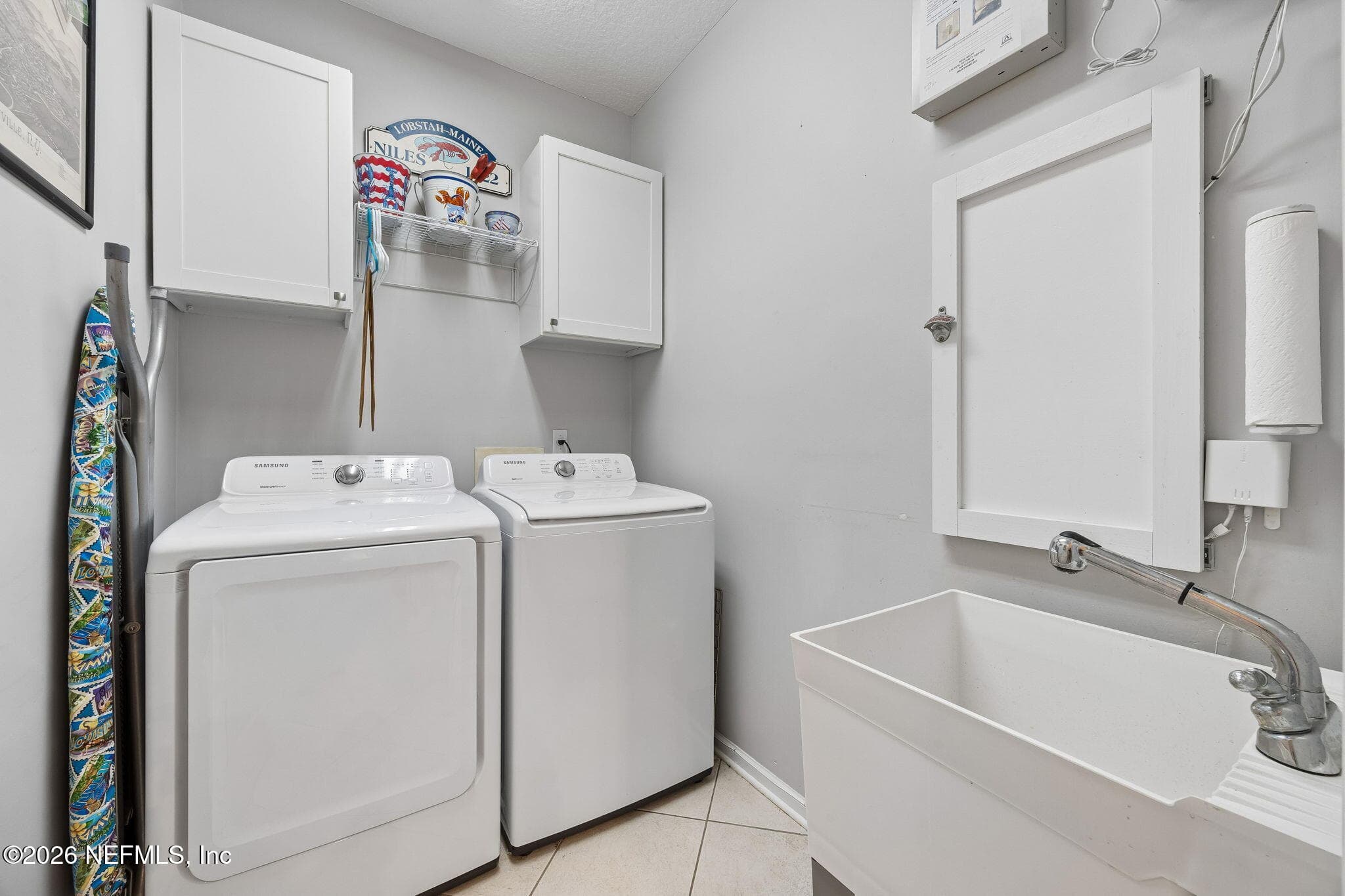 Separate laundry room just off the garage for everyday convenience and organization. — 85225 AMAGANSETT Drive, Fernandina Beach, FL 32034
