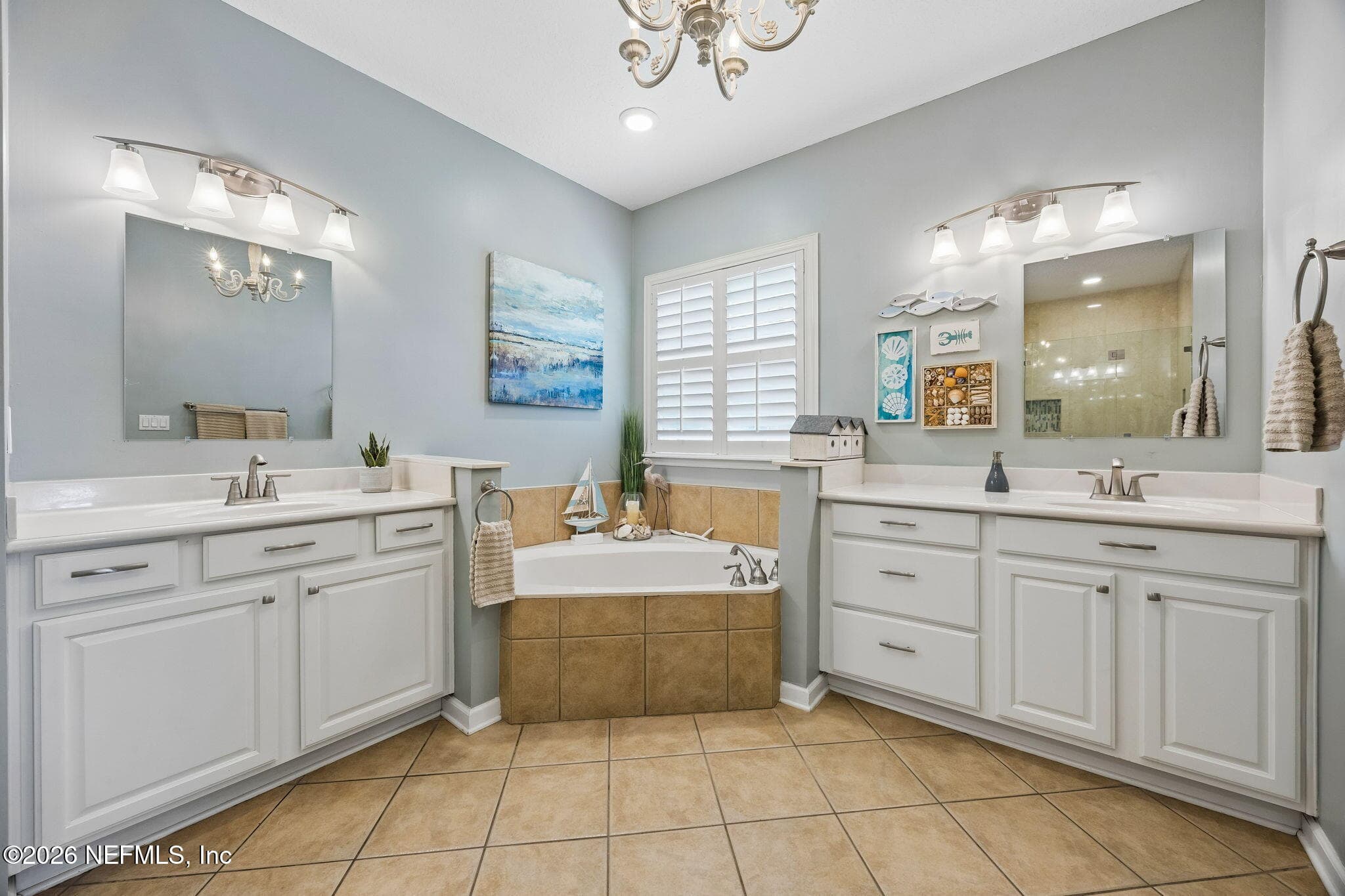 Primary bathroom features dual vanities. — 85225 AMAGANSETT Drive, Fernandina Beach, FL 32034