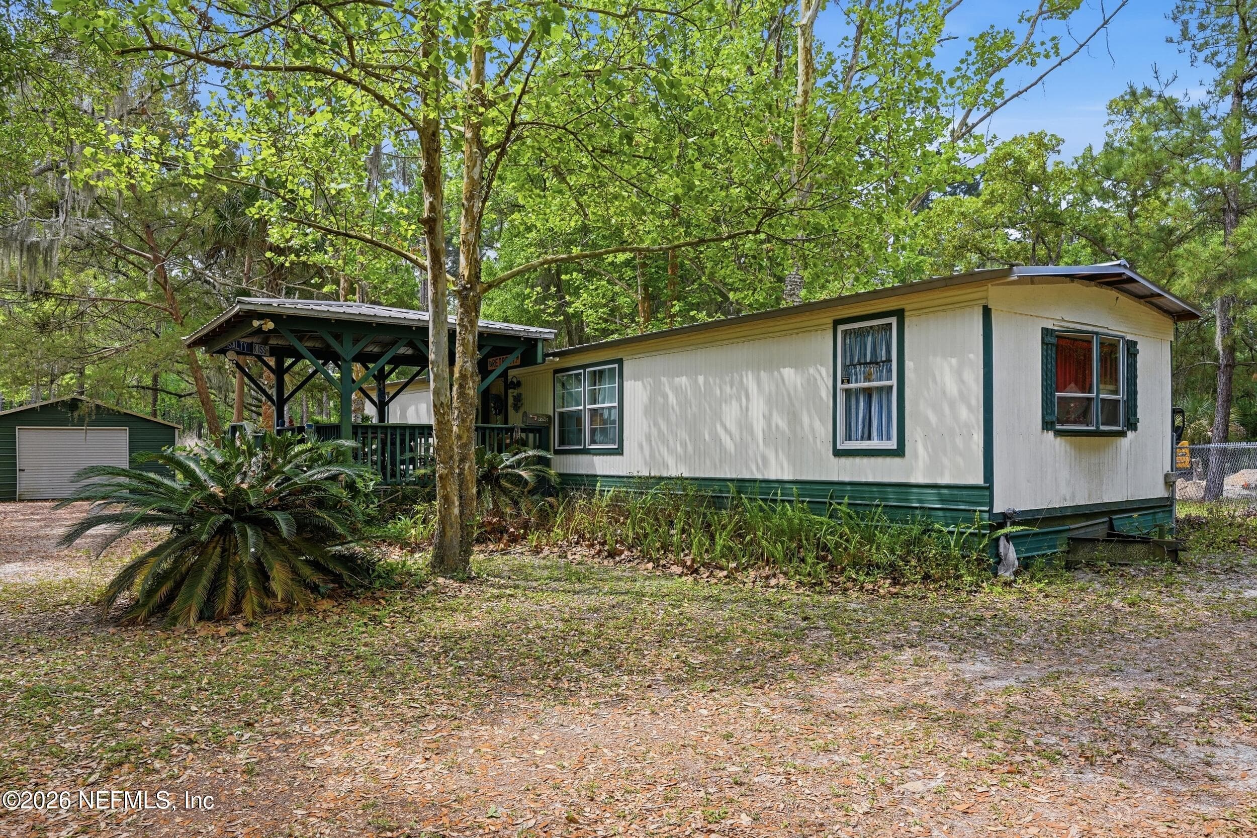 Large lot with many trees offers privacy from neighbors — 85045 LONNIE CREWS Road, Fernandina Beach, FL 32034