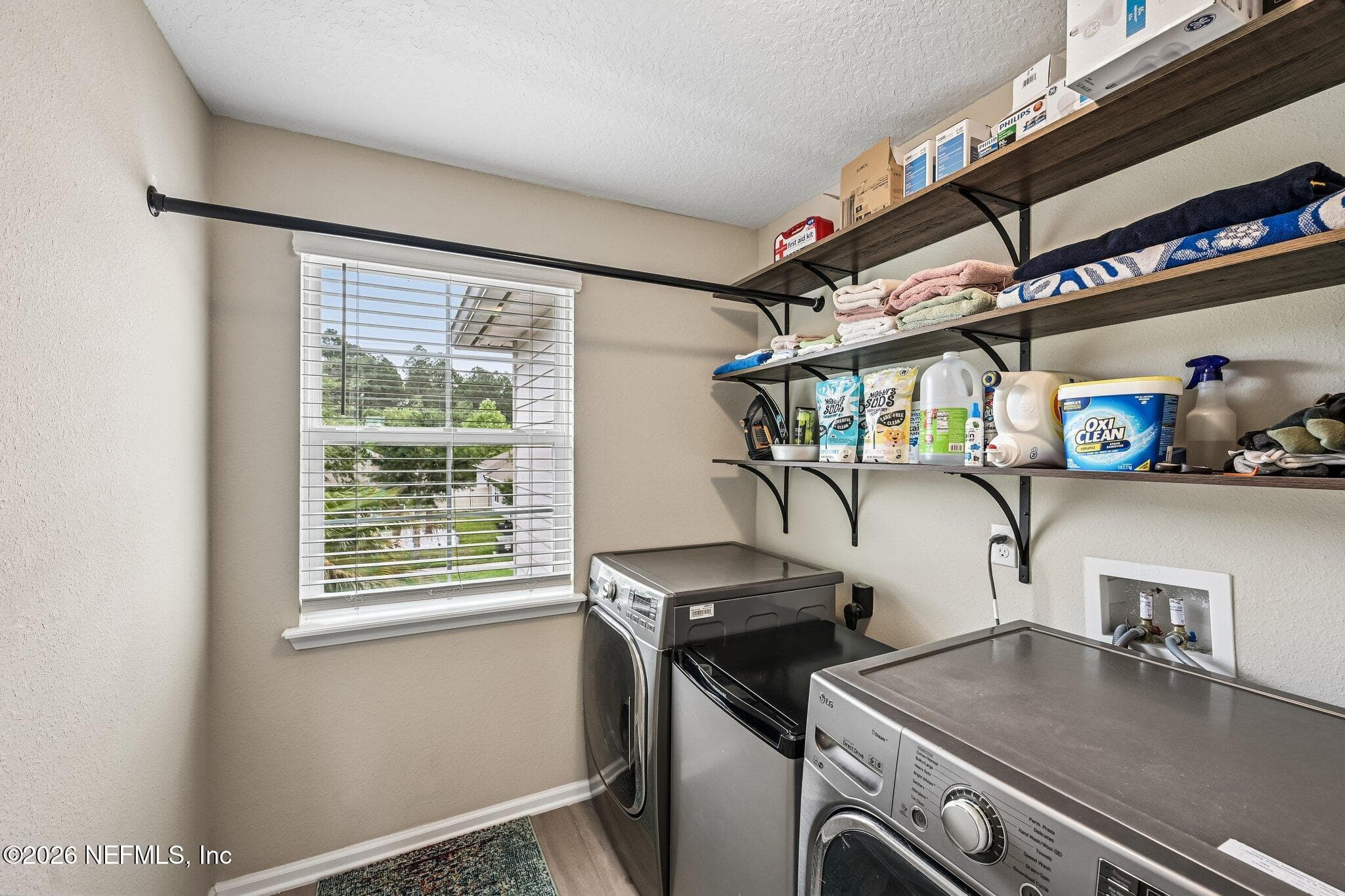 Upstairs laundry room for convenience — 15694 CHIR PINE Drive, Jacksonville, FL 32218