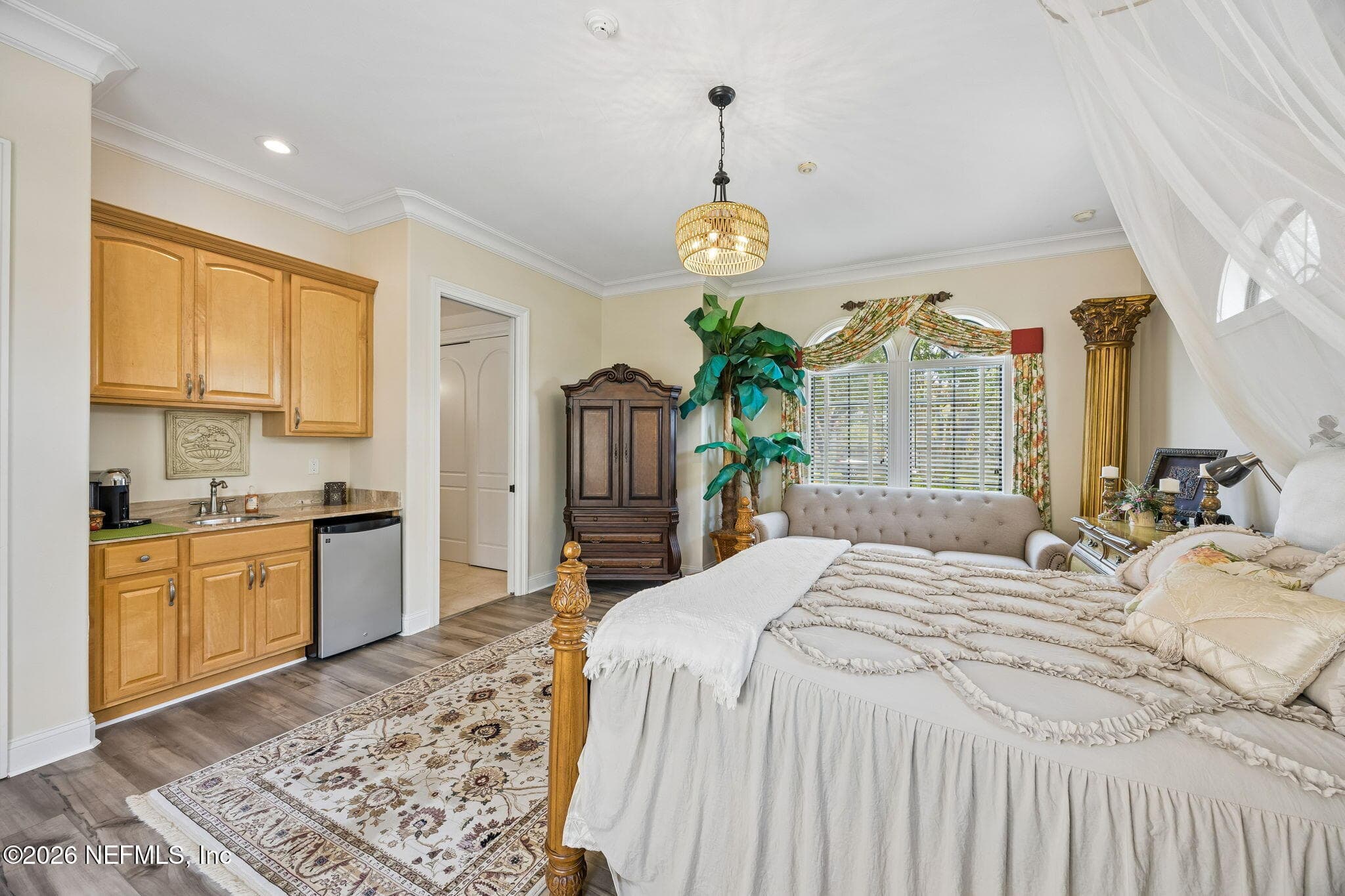 The casita includes a convenient wet bar and coffee area, creating a stylish and self-contained space ideal for guests or extended stays. — 430 ROYAL TERN Road S, Jacksonville Beach, FL 32250