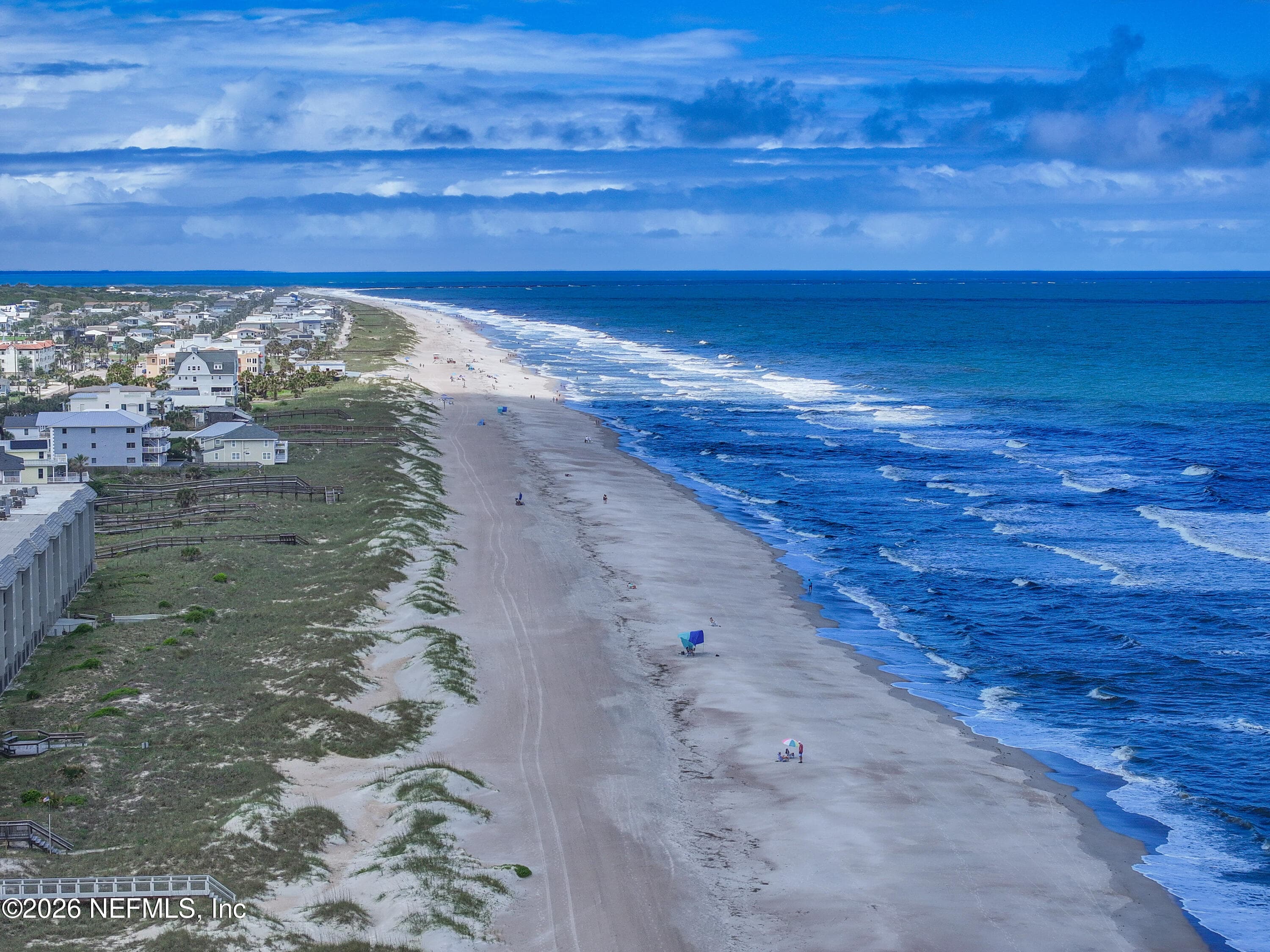 Looking to the north end of the island from Beach Access 6 where you can stroll the beach for miles — 865 LAGUNA Drive, Fernandina Beach, FL 32034