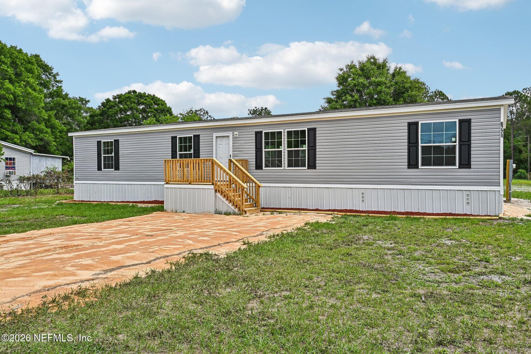 Brand new home on 1 acre of land — 6771 SW COUNTY ROAD 225, Starke, FL 32091