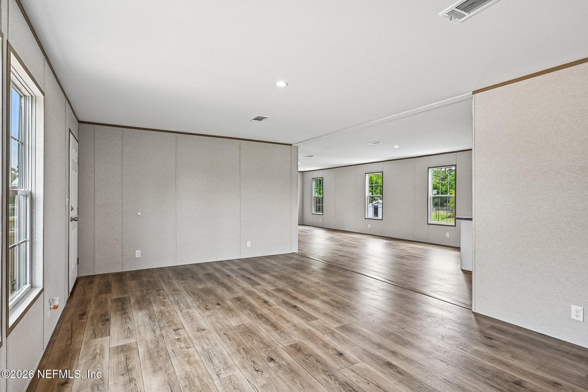 LIVING ROOM FROM PRIMARY TO DINING VIEW — 6771 SW COUNTY ROAD 225, Starke, FL 32091