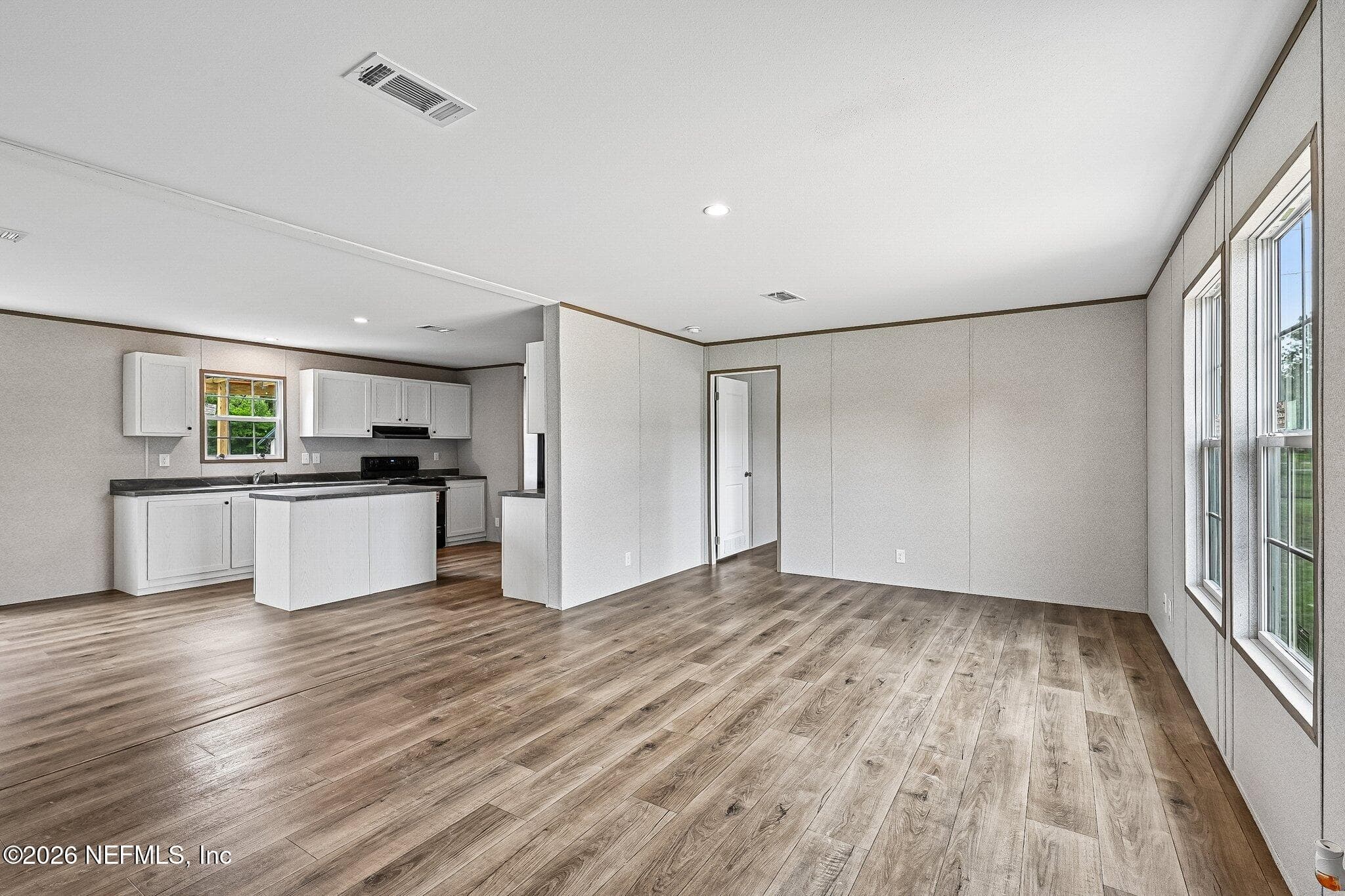 FROM FRONT DOOR living room to kitchen. — 6771 SW COUNTY ROAD 225, Starke, FL 32091