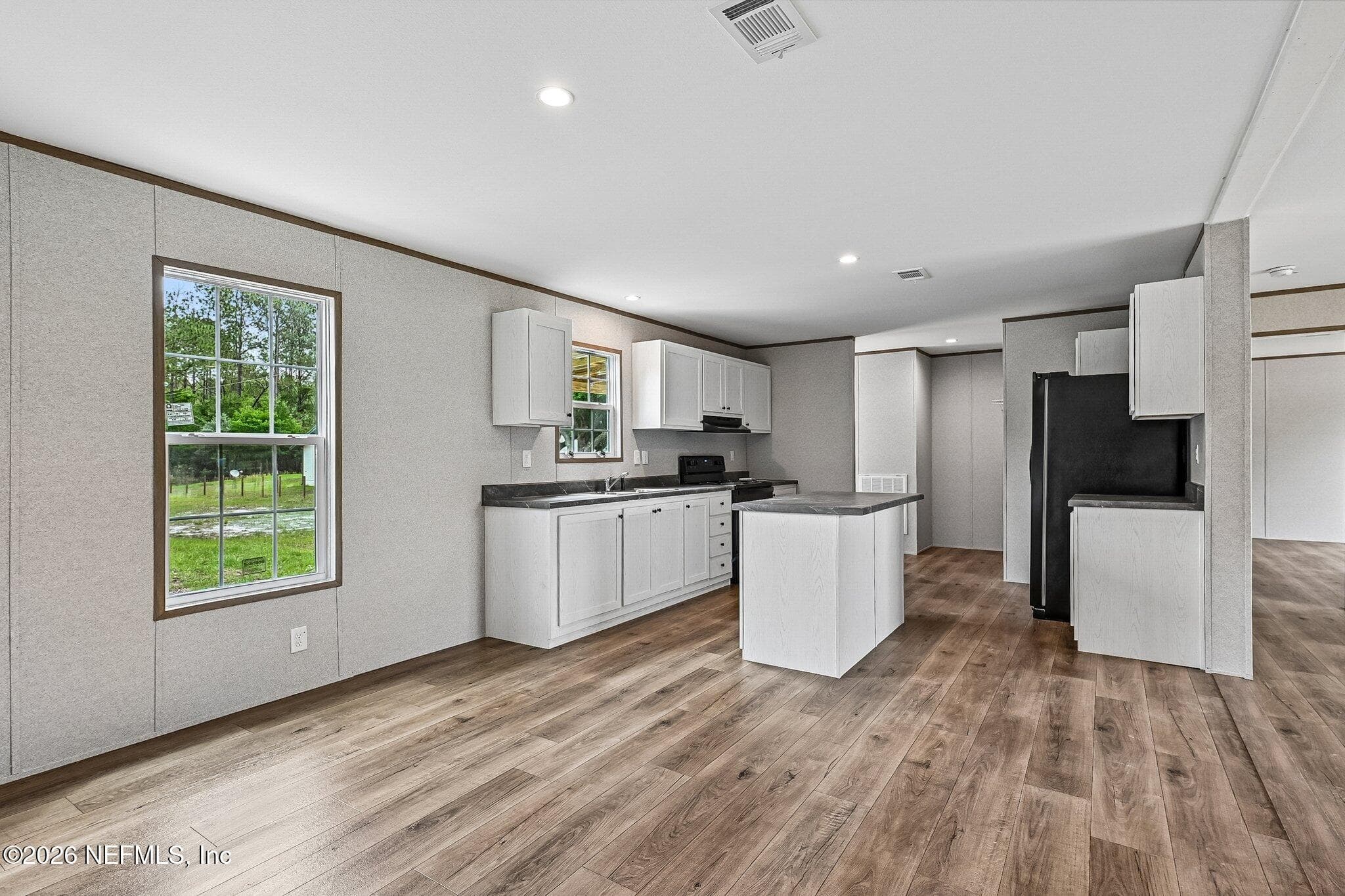 kitchen from dining room view — 6771 SW COUNTY ROAD 225, Starke, FL 32091