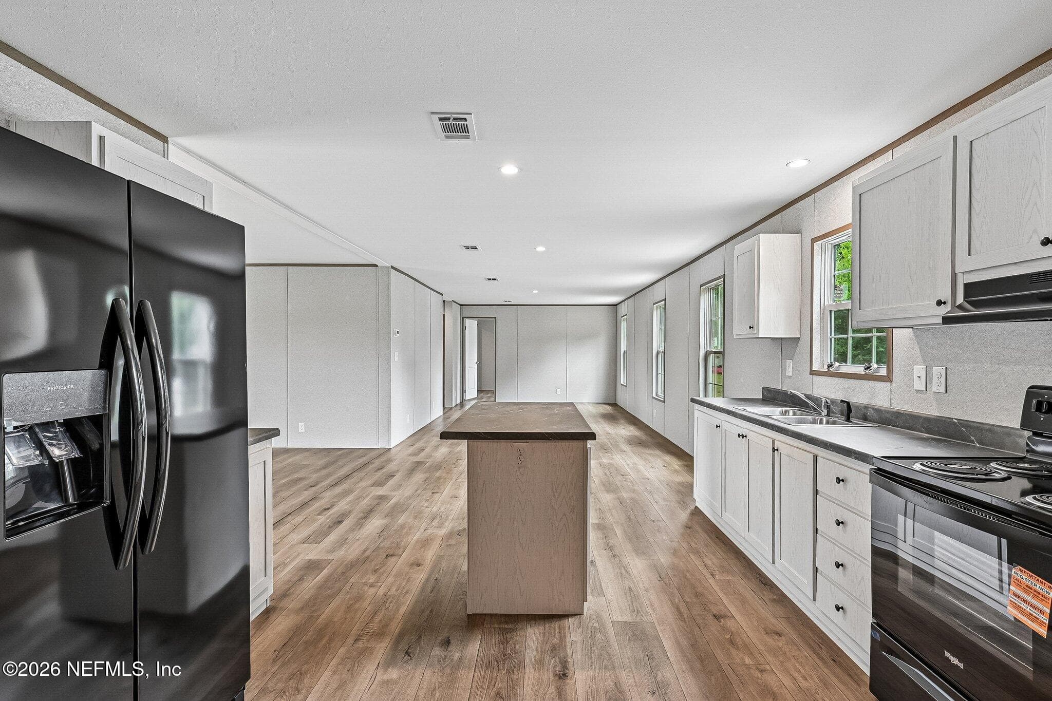 KITCHEN TO DINING DEN AREA — 6771 SW COUNTY ROAD 225, Starke, FL 32091