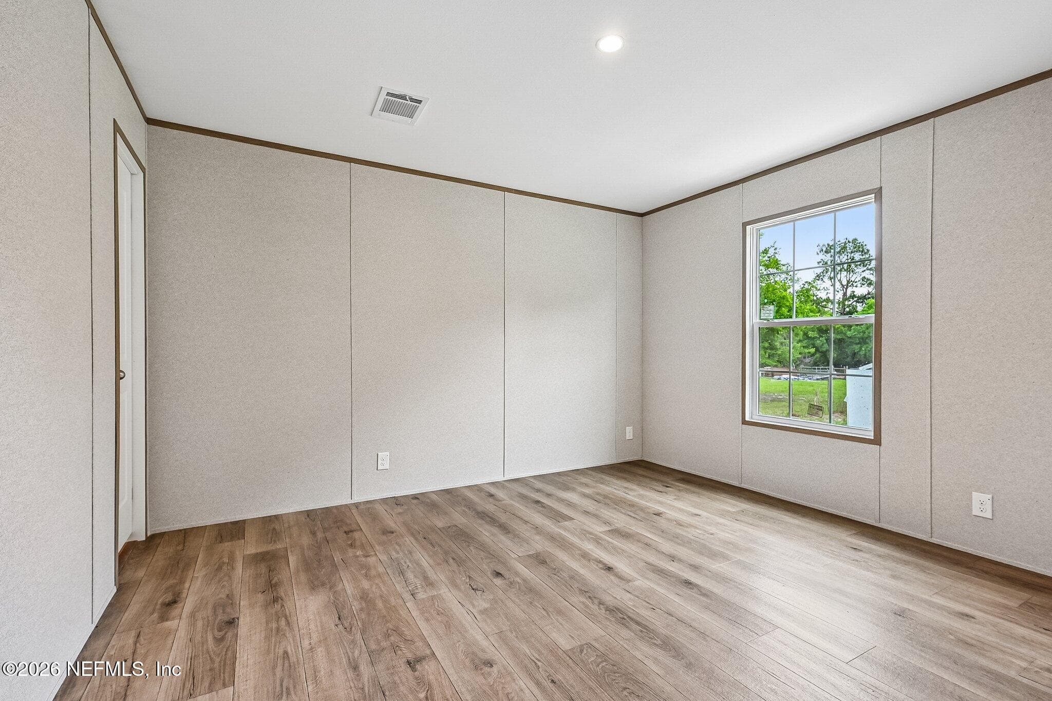 BEDROOM 1 REAR LEFT CORNER. ACTUAL LAYOUT OF ROOM — 6771 SW COUNTY ROAD 225, Starke, FL 32091