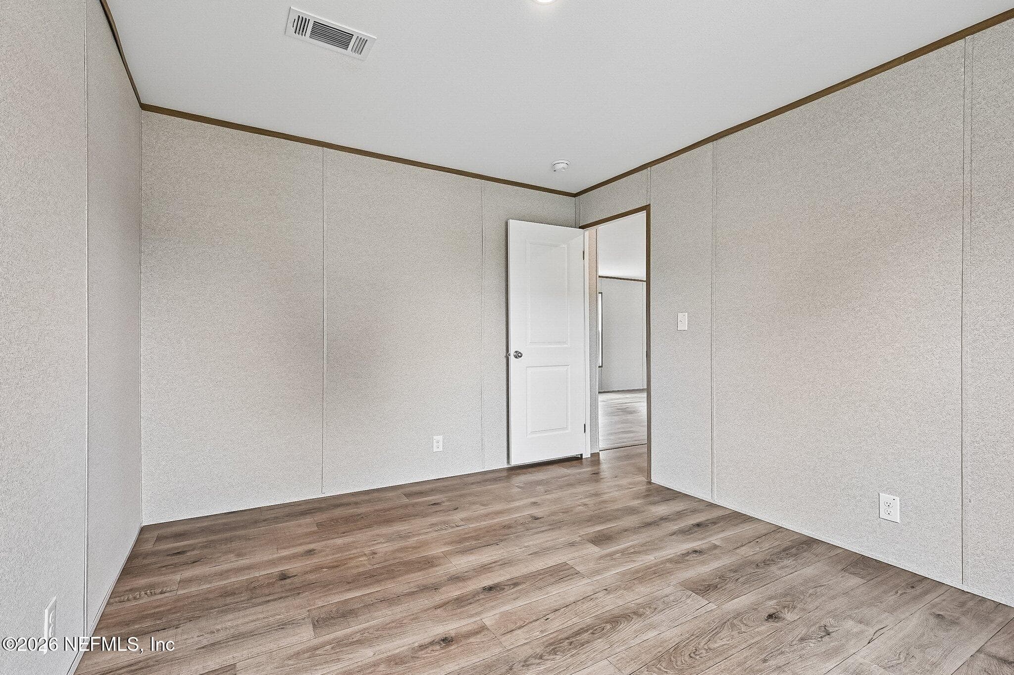 BEDROOM 2 FRONT LEFT CORNER — 6771 SW COUNTY ROAD 225, Starke, FL 32091