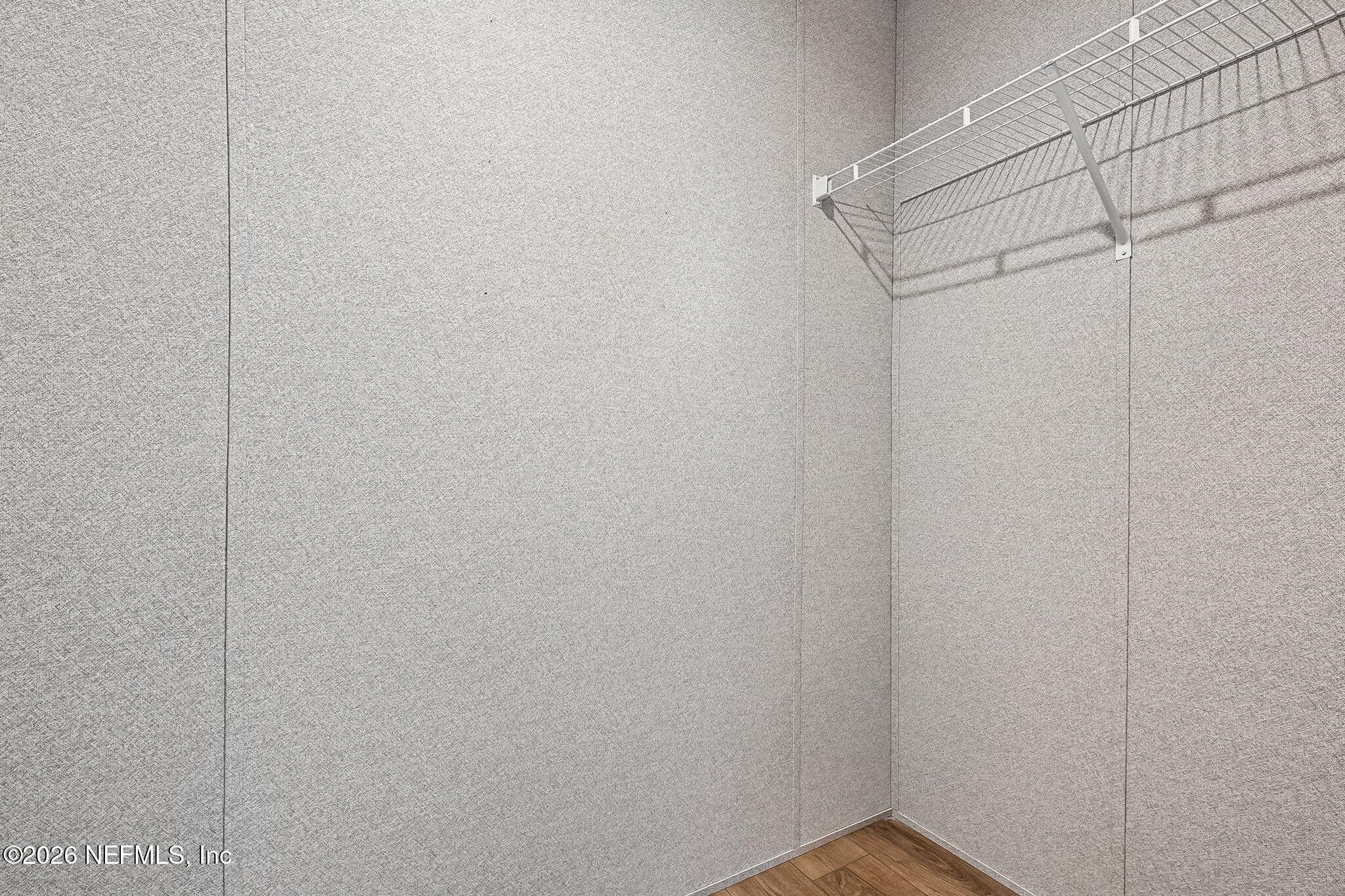 primary closet within the primary bath — 6771 SW COUNTY ROAD 225, Starke, FL 32091
