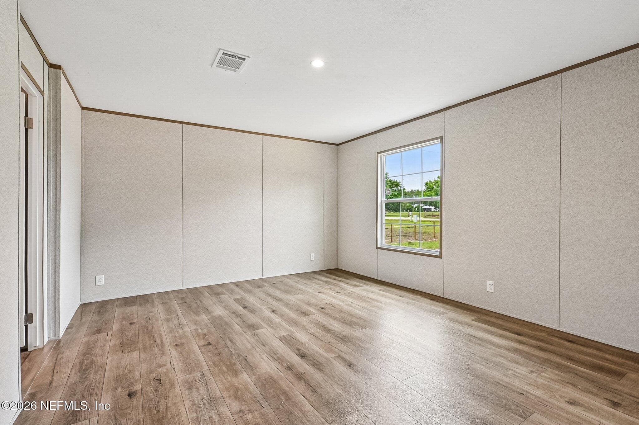 PRIMARY BEDROOM FRONT RIGHT SIDE — 6771 SW COUNTY ROAD 225, Starke, FL 32091