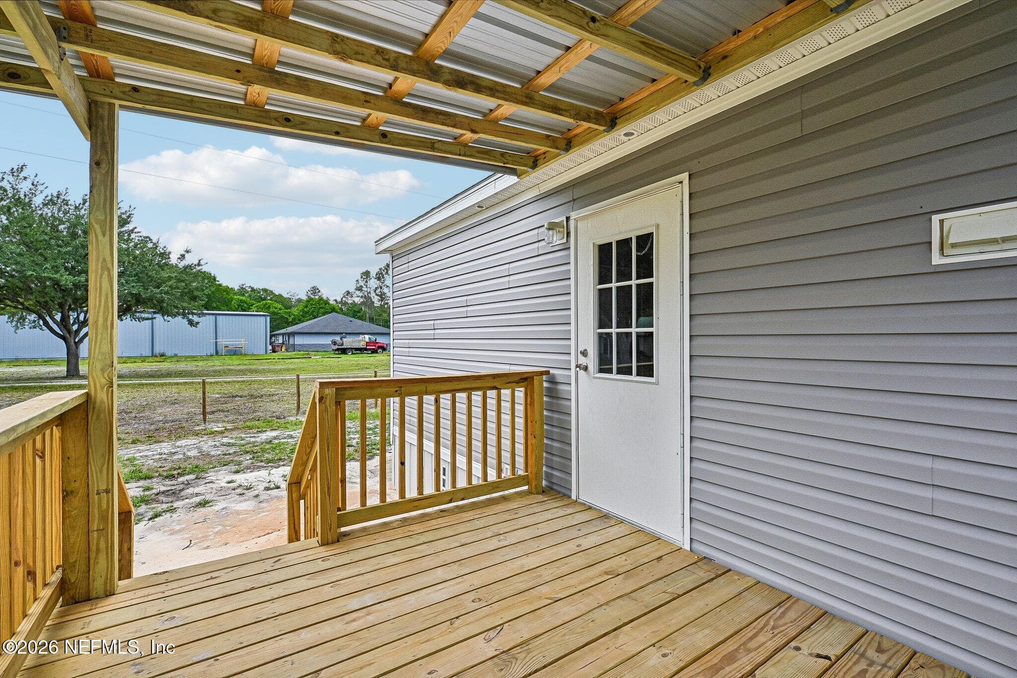 REAR DOOR ACCES TO LARGE COVERED DECK — 6771 SW COUNTY ROAD 225, Starke, FL 32091