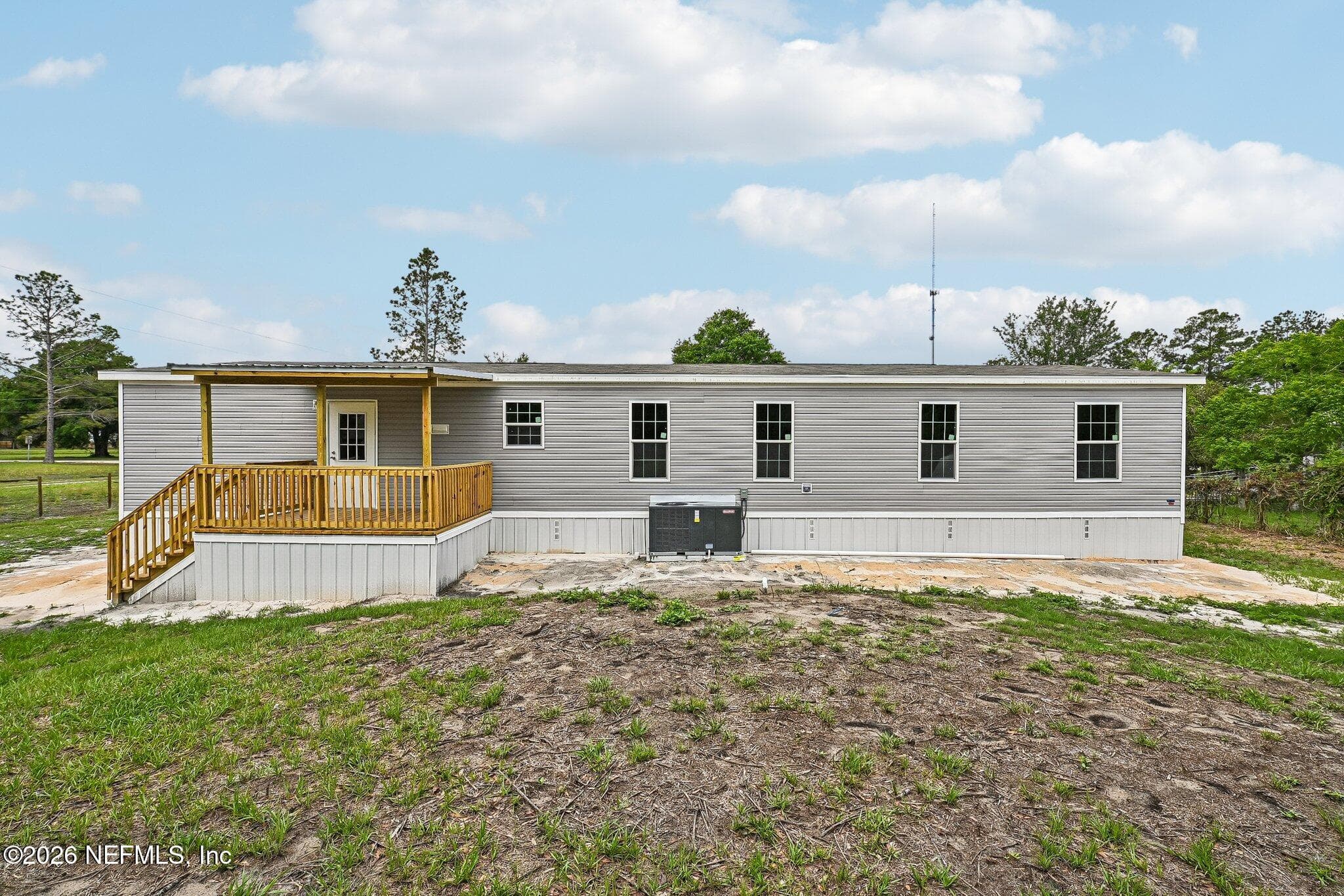 REAR OF HOUSE NEW AC AND COVERED DECK — 6771 SW COUNTY ROAD 225, Starke, FL 32091