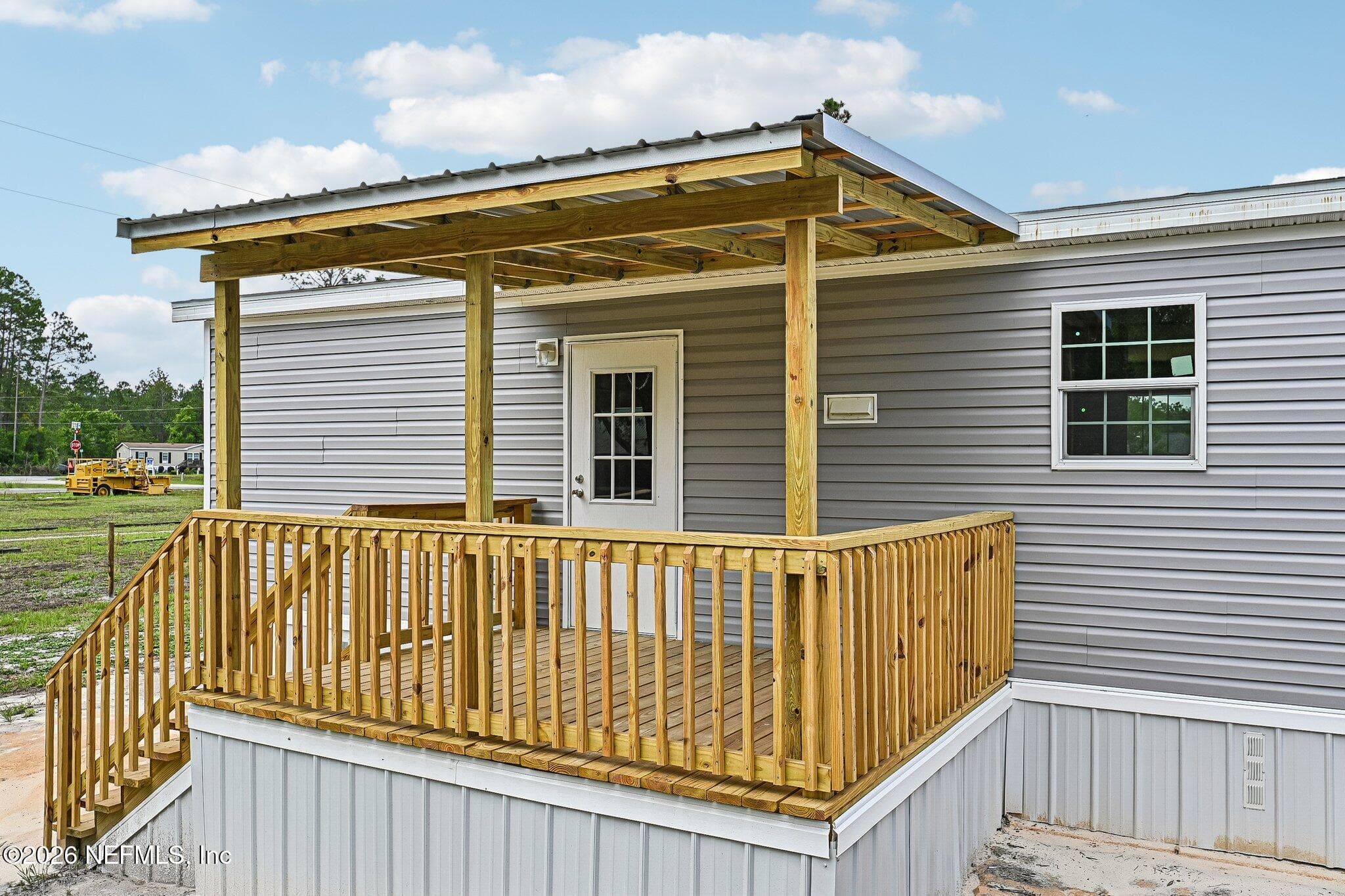 BEAUTIFUL COVERED DECK REAR OF HOUSE — 6771 SW COUNTY ROAD 225, Starke, FL 32091