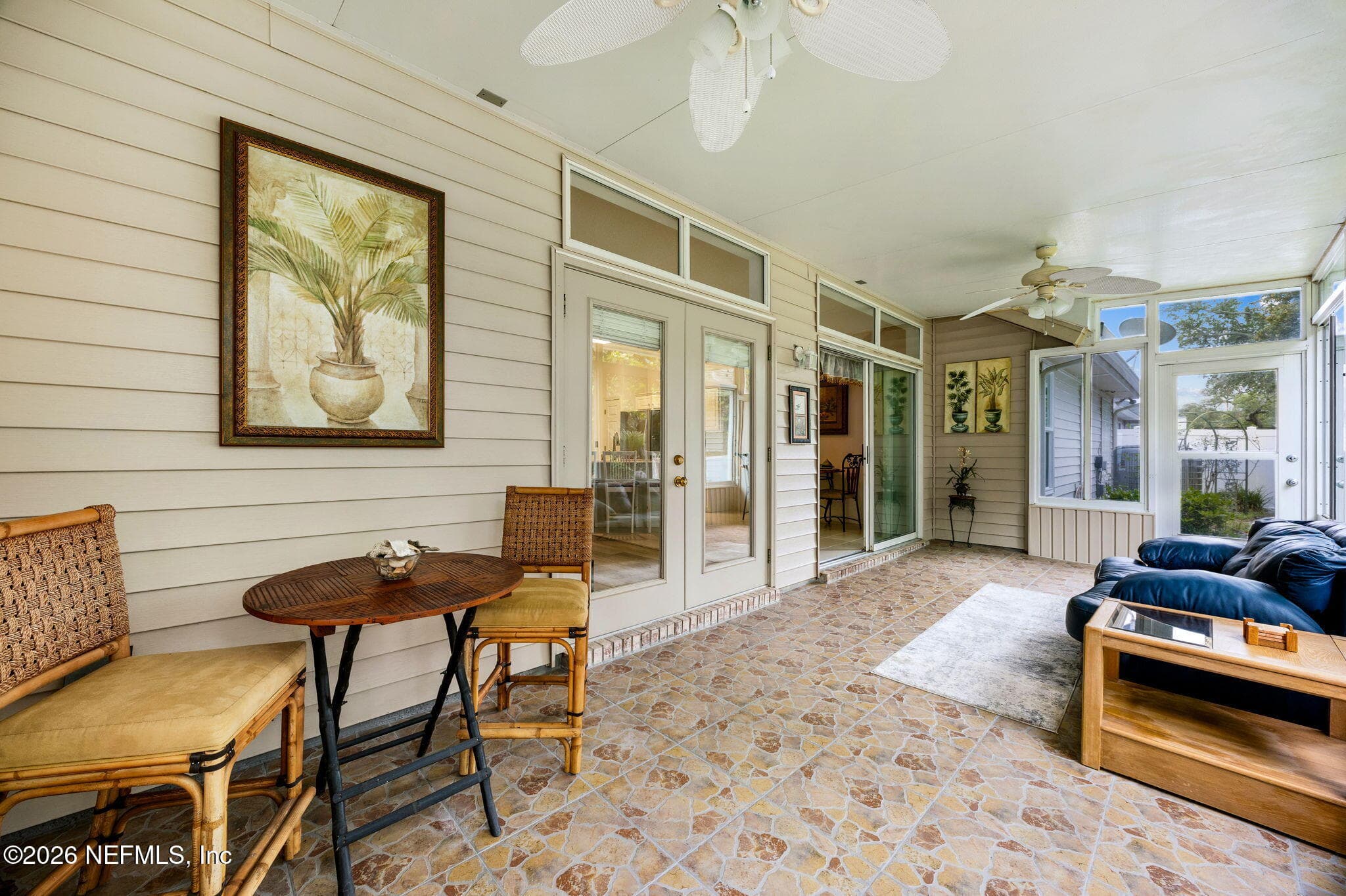 Enclosed Florida Room - great for entertaining and relaxing — 865 LAGUNA Drive, Fernandina Beach, FL 32034