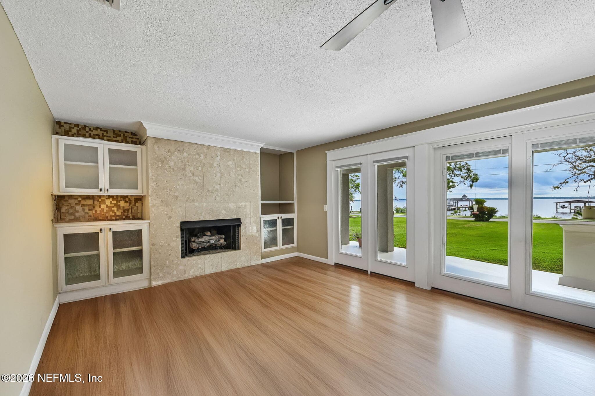 STAGED- Living Room with views of the St. Johns Rive — 1320 RIVER Road, Orange Park, FL 32073