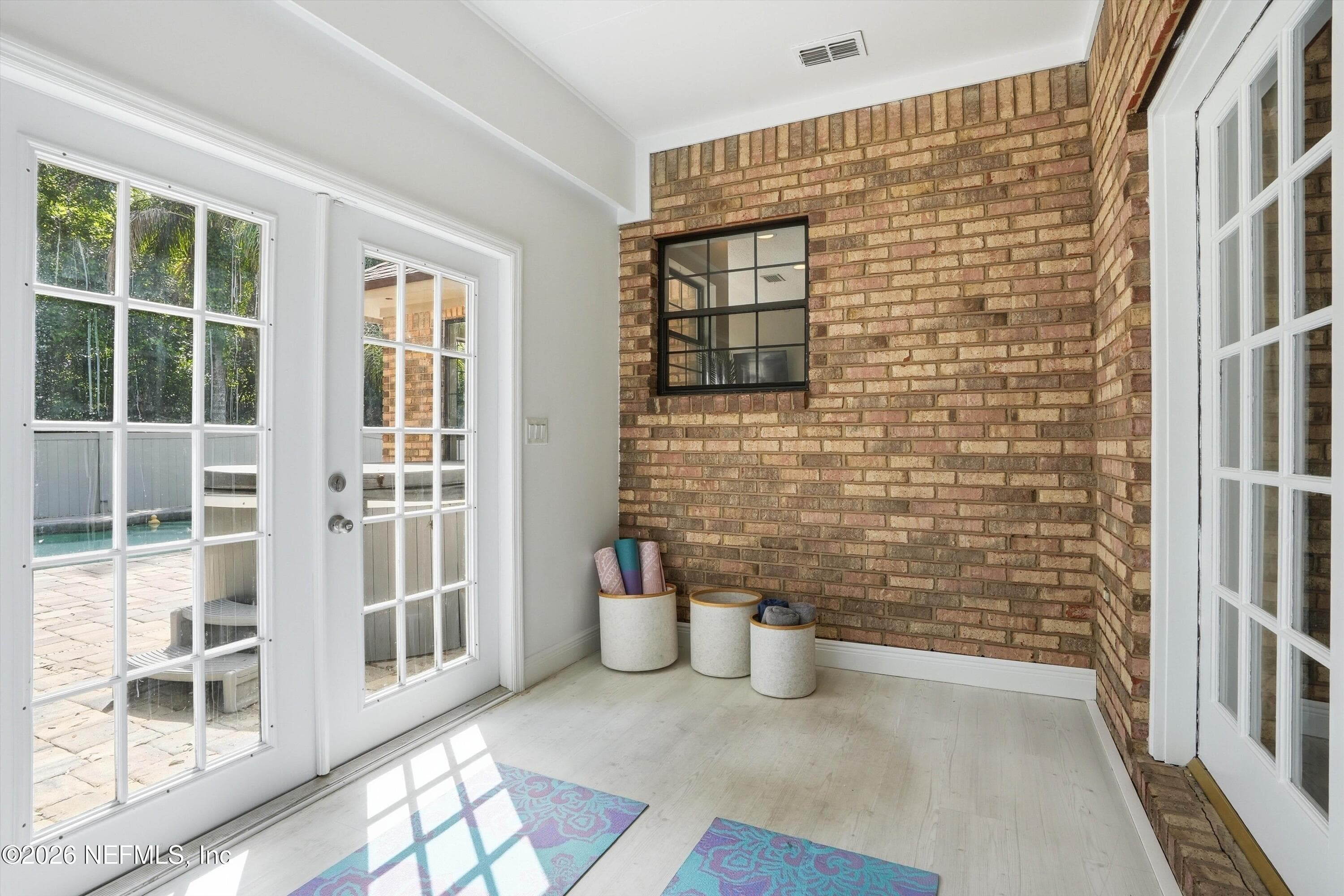Located off "mother-in-law" suite bedroom. Currently staged as a gym, makes a great music room, office, or sitting room. — 1817 SPICEBERRY Circle E, Jacksonville, FL 32246