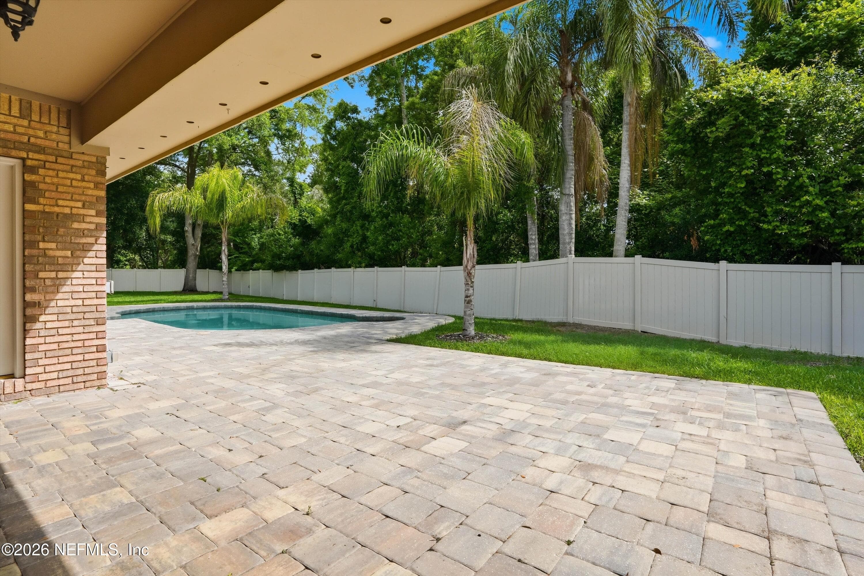 Huge paver deck area — 1817 SPICEBERRY Circle E, Jacksonville, FL 32246