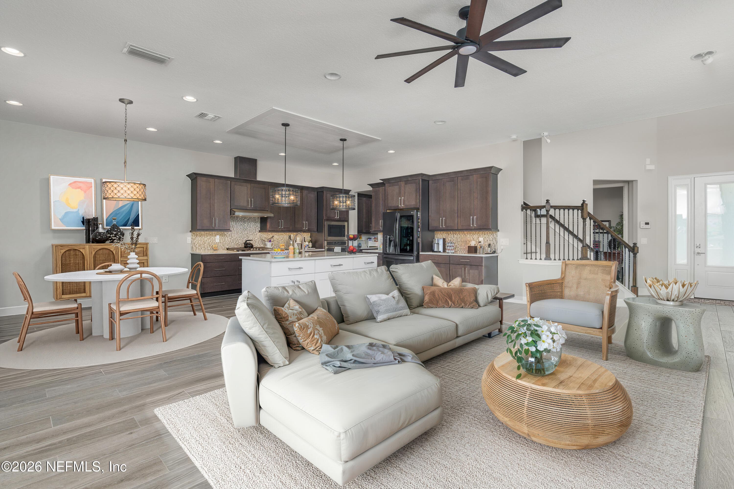 Bright and Open Concept Living area and Kitchen — 703 RUM RUNNER Way, St. Johns, FL 32259