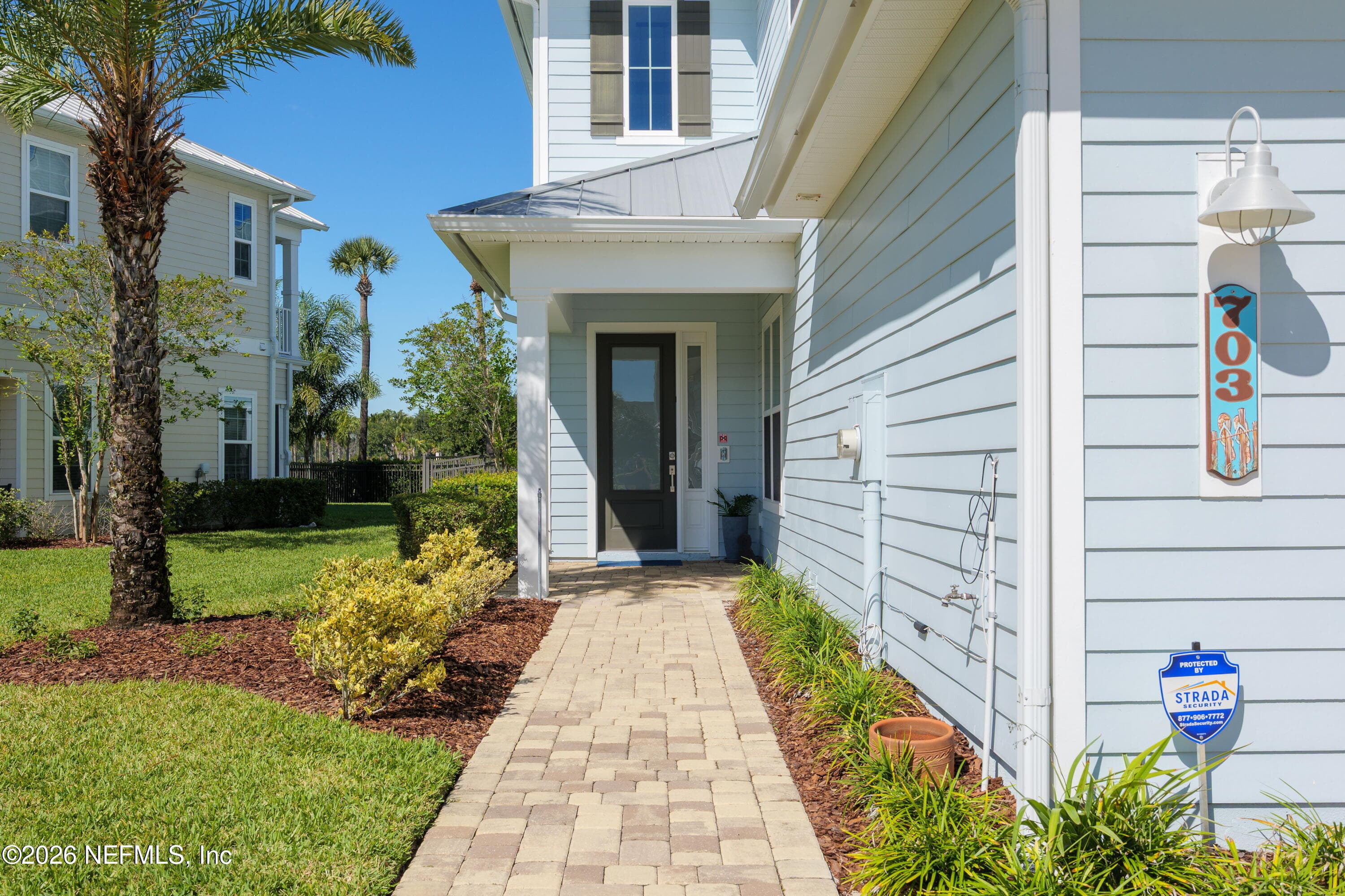 Private entryway with beautiful paver walkway — 703 RUM RUNNER Way, St. Johns, FL 32259