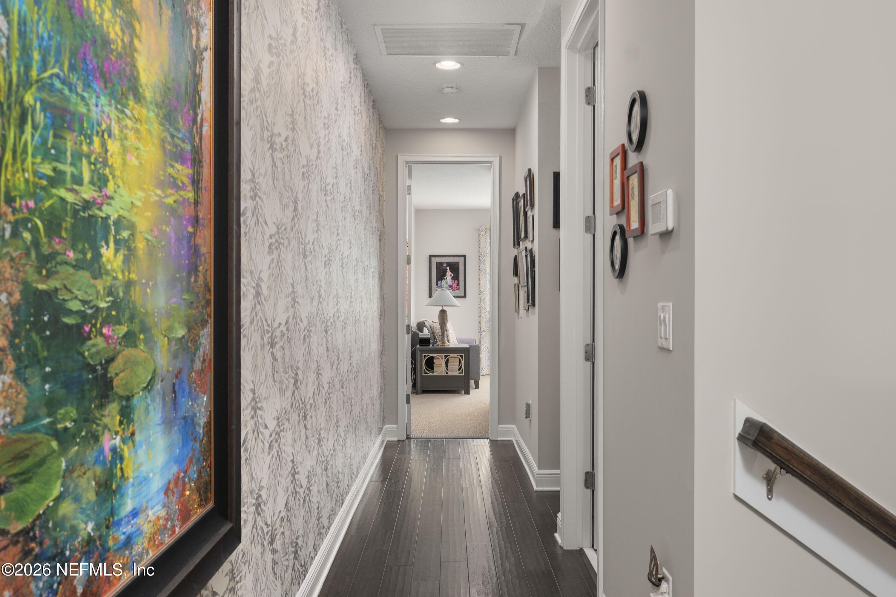 Hallway from Main Bedroom looking towards additional 2 bedrooms, Jack and Jill Bath and Laundry — 703 RUM RUNNER Way, St. Johns, FL 32259