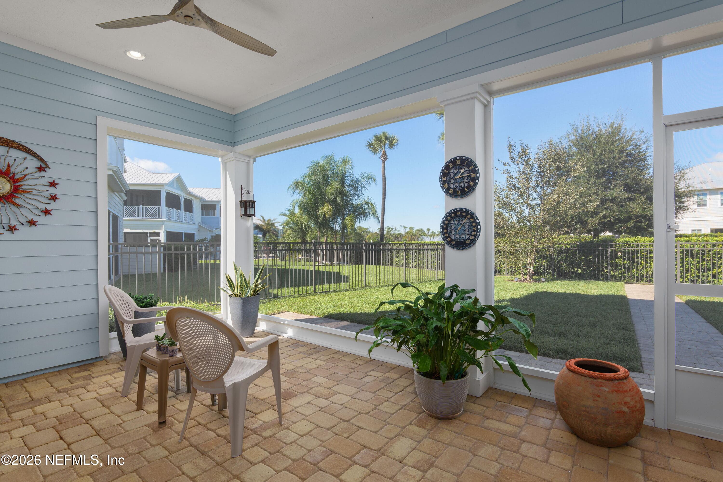 Screened lania leading to fenced in backyard perfect for kids and pets! — 703 RUM RUNNER Way, St. Johns, FL 32259