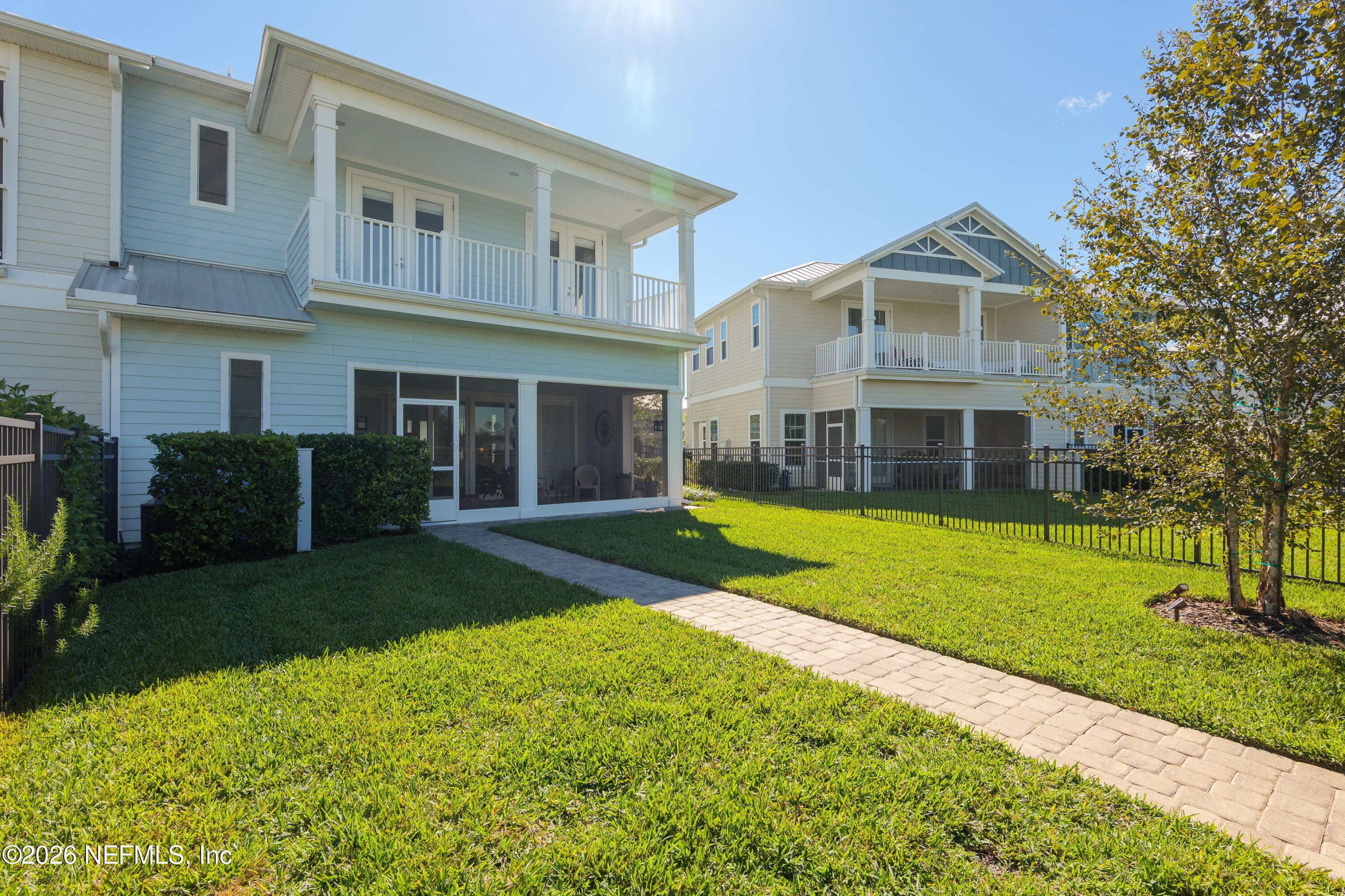 Fenced in backyard leading to screened in lania — 703 RUM RUNNER Way, St. Johns, FL 32259