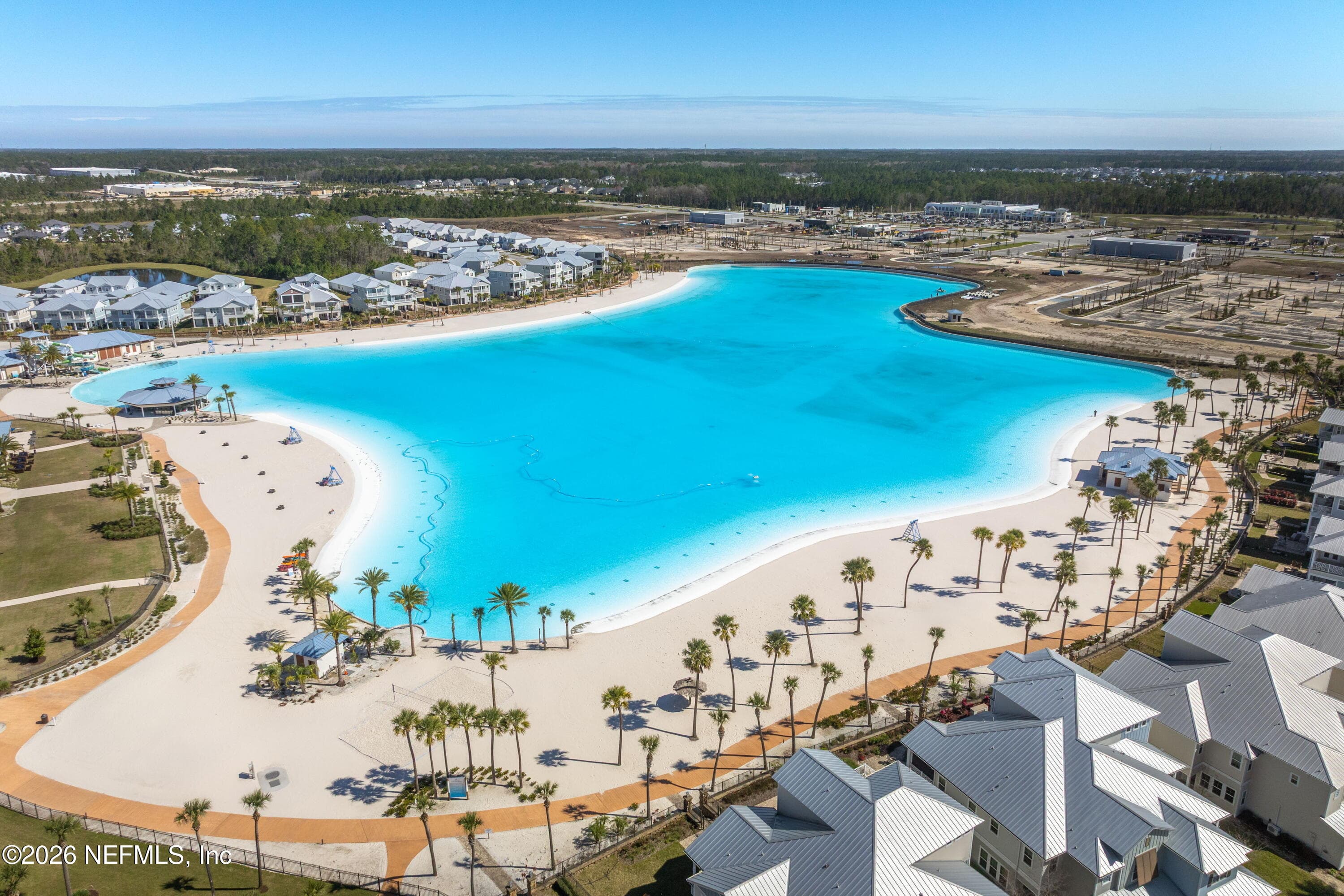 14 acre lagoon with crystal clear water, surrounded by sand. Rum Runner Way has 2 private entrances to walk right onto beach! — 703 RUM RUNNER Way, St. Johns, FL 32259